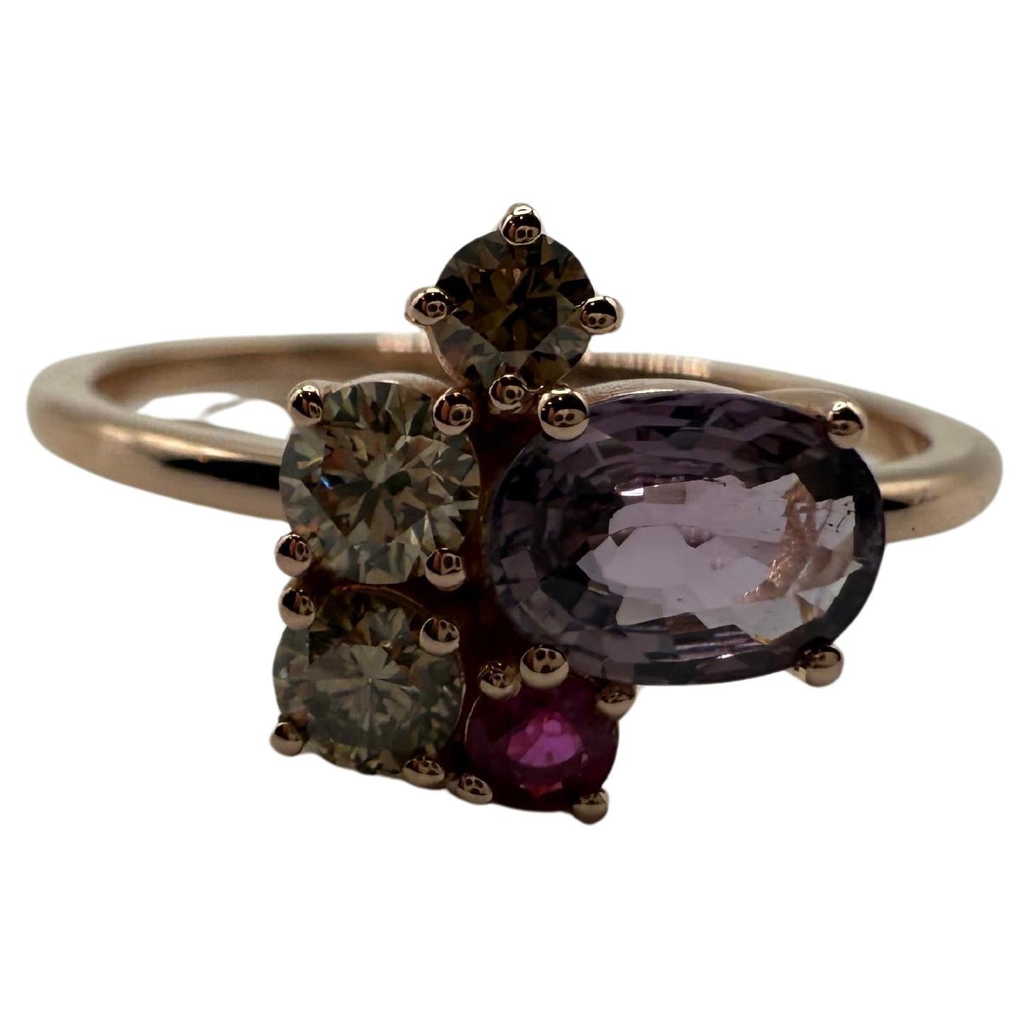 One of a kind cluster ring made with purple sapphire, champagne diamonds and a ruby in 14KT rose gold, such a colorful ring with stunning cluster combination. Size 7 and can be re-sized.

This is one of the most popular designs today, a wedding band