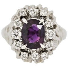 Bague en platine avec saphir violet et diamants