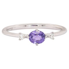 Anello con zaffiro viola e diamante estratto dalla terra in oro bianco massiccio 14 carati  OV 5x4mm