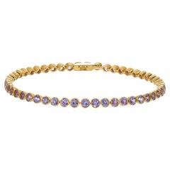 Bracelet "Tennis" en saphir violet serti dans de l'or jaune par Rosior