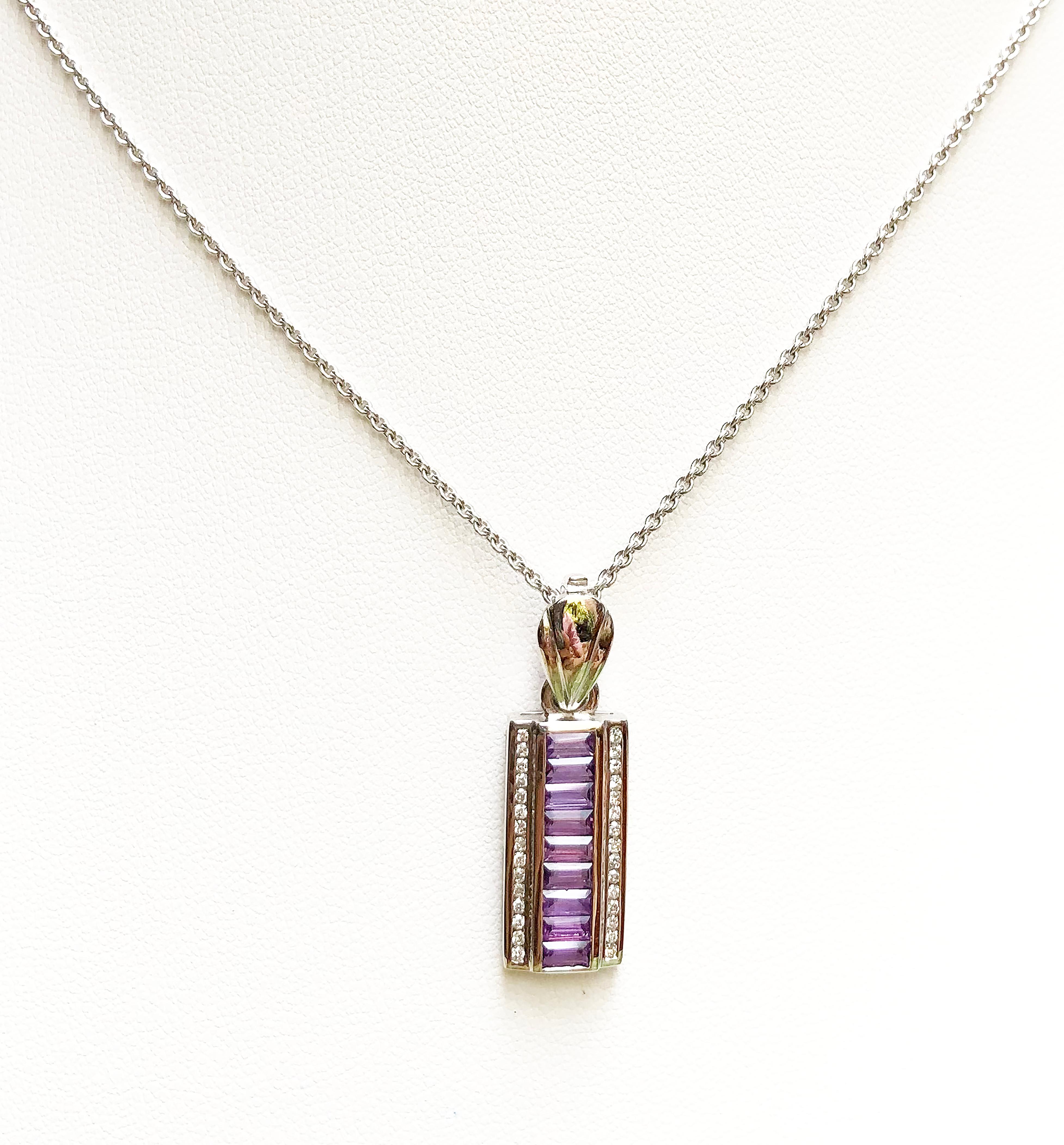 Purple Sapphire 1.47 carats with Diamond 0.21 carat Pendant set in 18 Karat White Gold Settings
(chain not included)

Width:  1.0 cm 
Length: 3.1 cm
Total Weight: 5.39 grams

