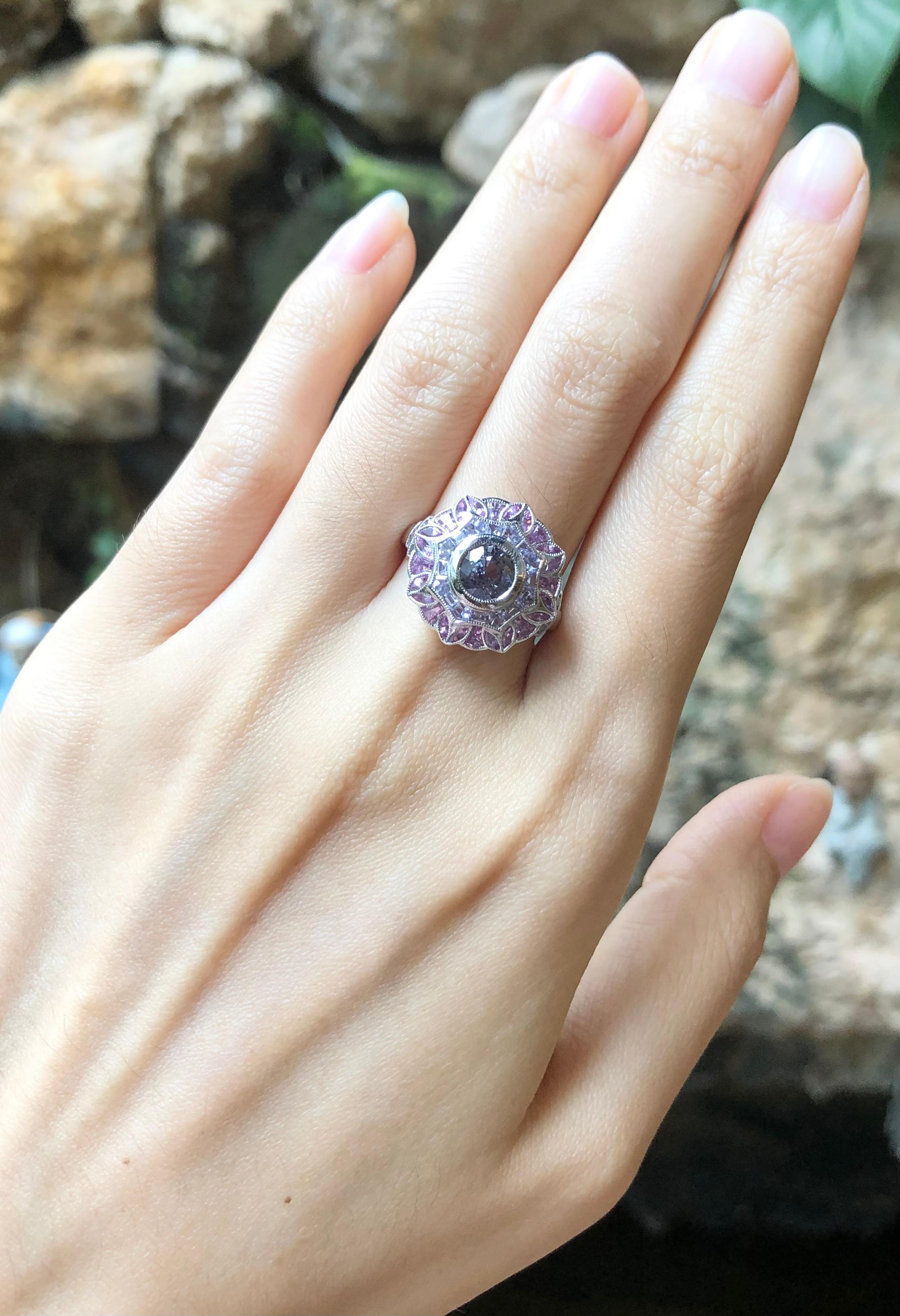 Purple Sapphire 1.52 carats (center) with Pink Sapphire 1.59 carats and Purple Sapphire 1.96 carats Ring set in 18 Karat White Gold Settings

Width:  1.6 cm 
Length: 1.6 cm
Ring Size: 54
Total Weight: 7.91 grams

