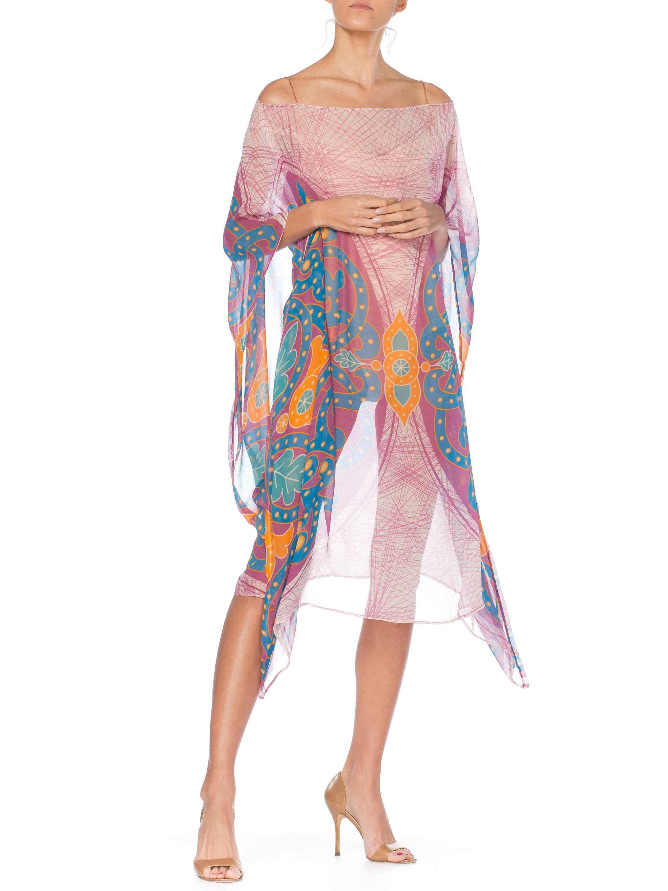 MORPHEW COLLECTION Pink  & Orange Silk Chiffon Butterfly Print Kaftan With Scarf Belt
MORPHEW COLLECTION is made entirely by hand in our NYC Ateliér of rare antique materials sourced from around the globe. Our sustainable vintage materials represent