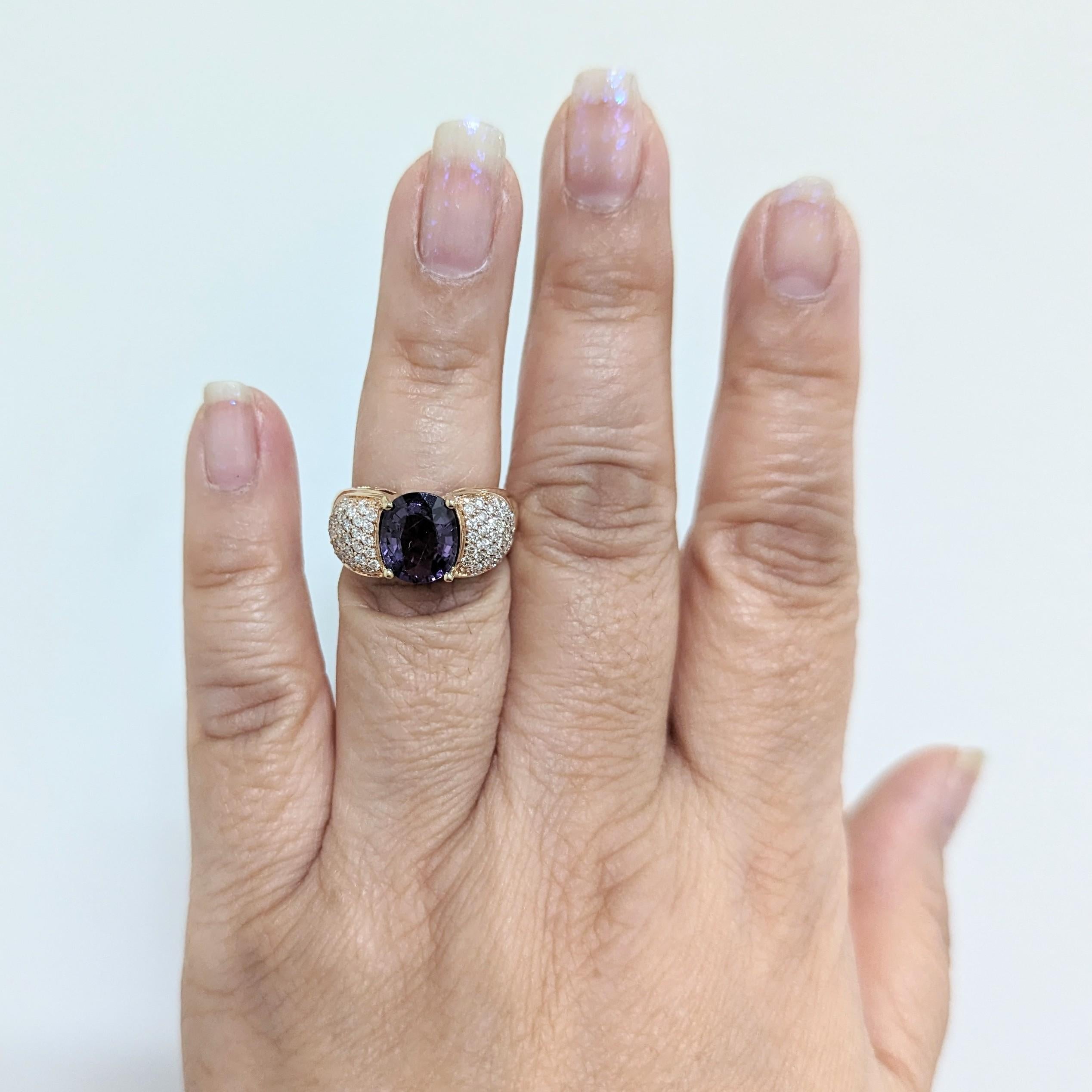 Beautiful 2.44 ct. purple spinel oval with 0.30 ct. good quality white diamond rounds.  Handmade in 18k rose gold.  Ring size 6.5.