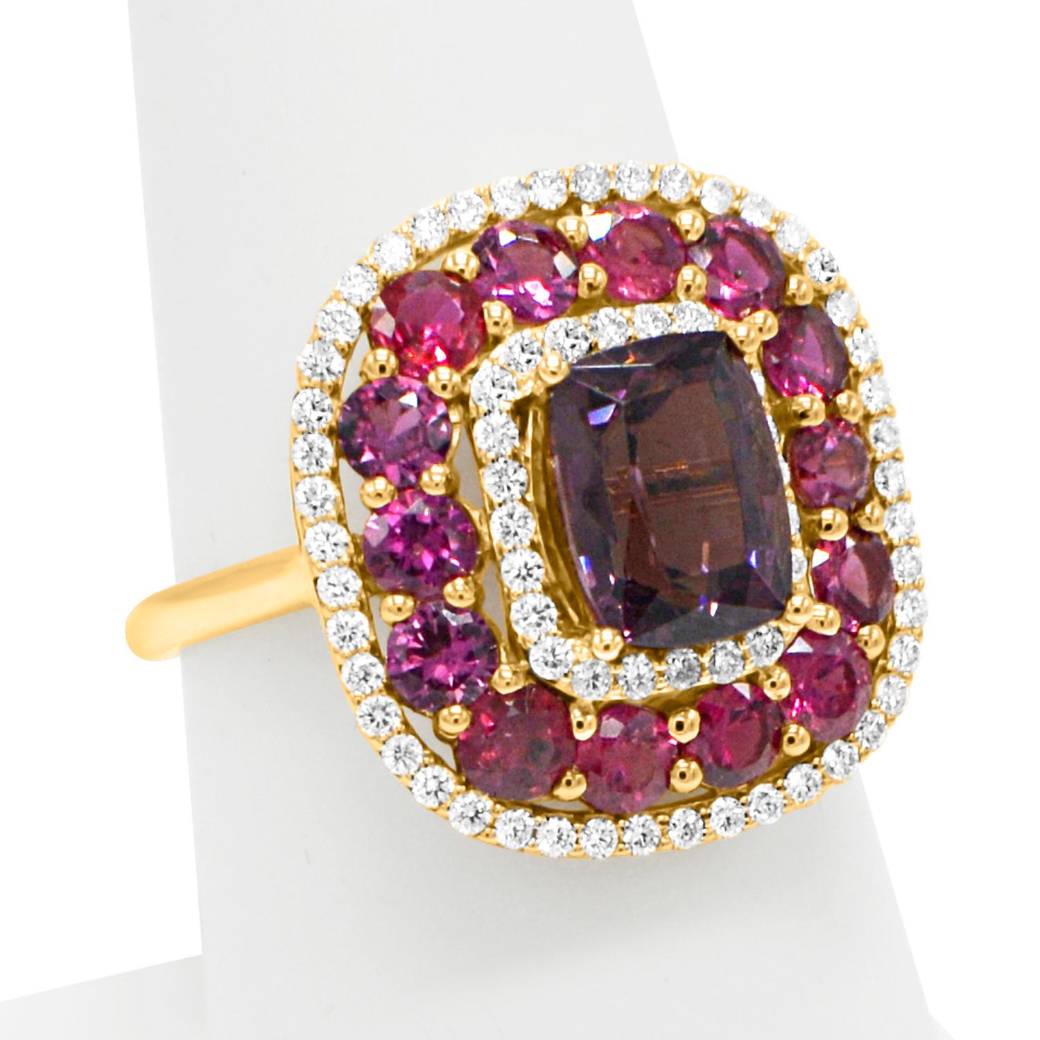 Brilliant - not heated or treated- all very natural.
Ruby &  Purple Spinel Cocktail Ring,
Center Natural Spinel 2.40 carat.
Surrounded with Natural Ruby - Total 2.11 carat
14k Rose Gold  5.0 grams, 
Diamonds 0.48 carat F-G-VVS.
Finger size 7
all
