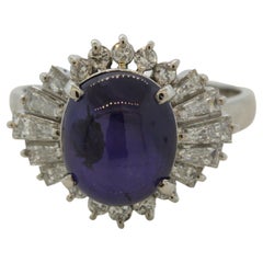 Bague en platine avec saphir étoilé violet et diamants