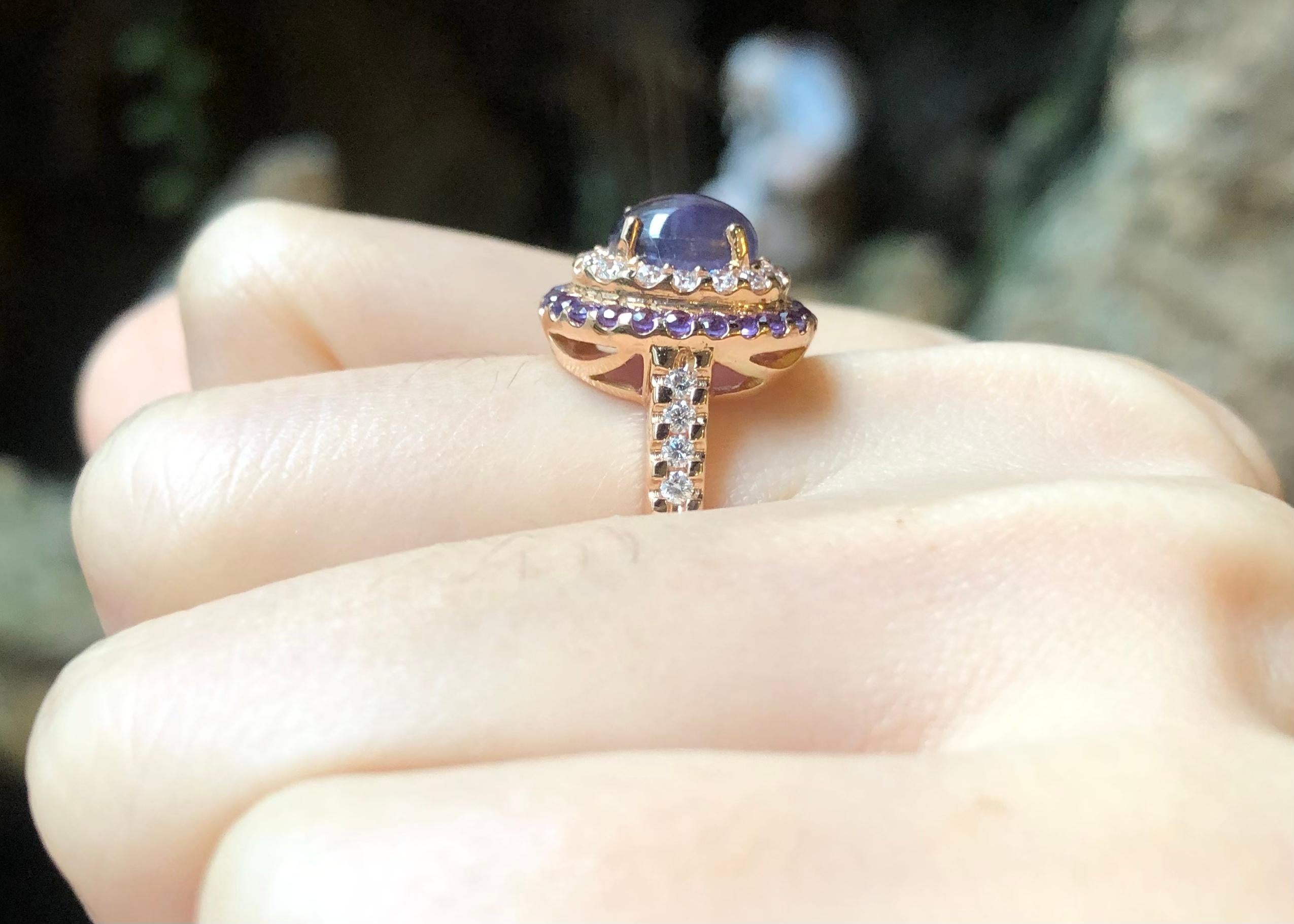 Purple Star Sapphire 2.50 carats, Purple Sapphire 0.59 carat and Diamond 0.36 carat Ring set in 18K Rose Gold Settings

Width:  1.2 cm 
Length: 1.4 cm
Ring Size: 53
Total Weight: 6.0 grams


