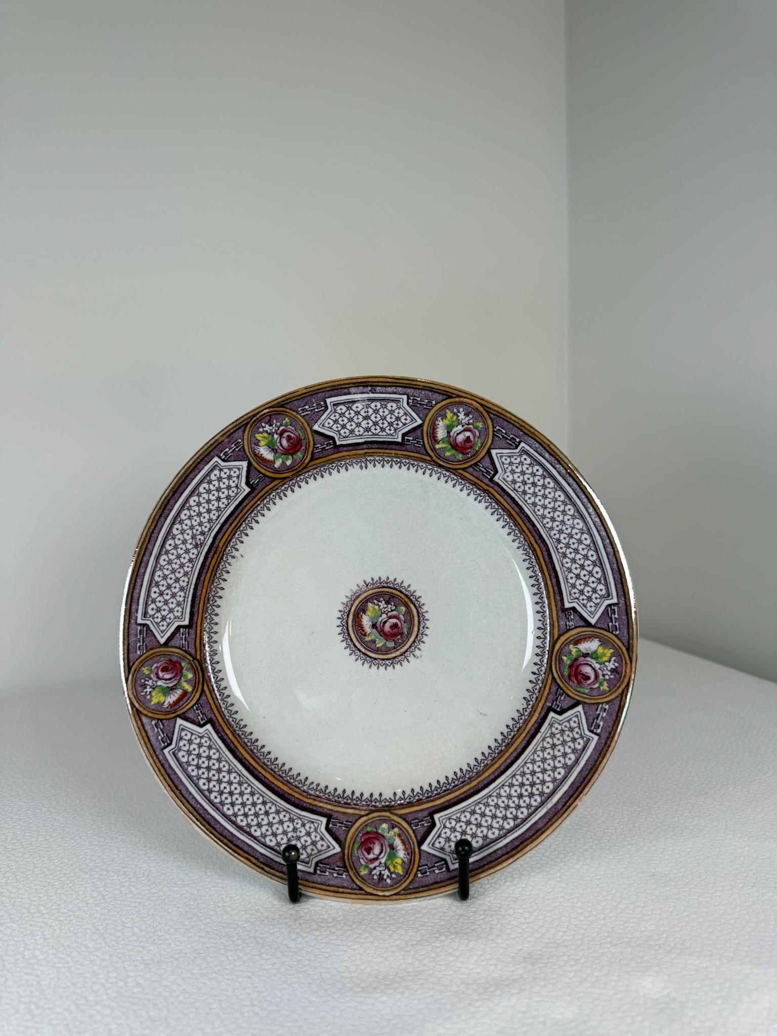 This charming purple “Terre de Fer” porcelain set evokes classic French elegance and rustic refinement. Characterized by its distinctive purple motifs and delicate patterns, each piece showcases subtle floral details and scrolling accents,