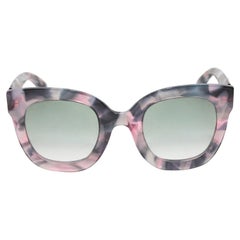 Occhiali da sole Gucci viola tartarugati e decorati con stelle