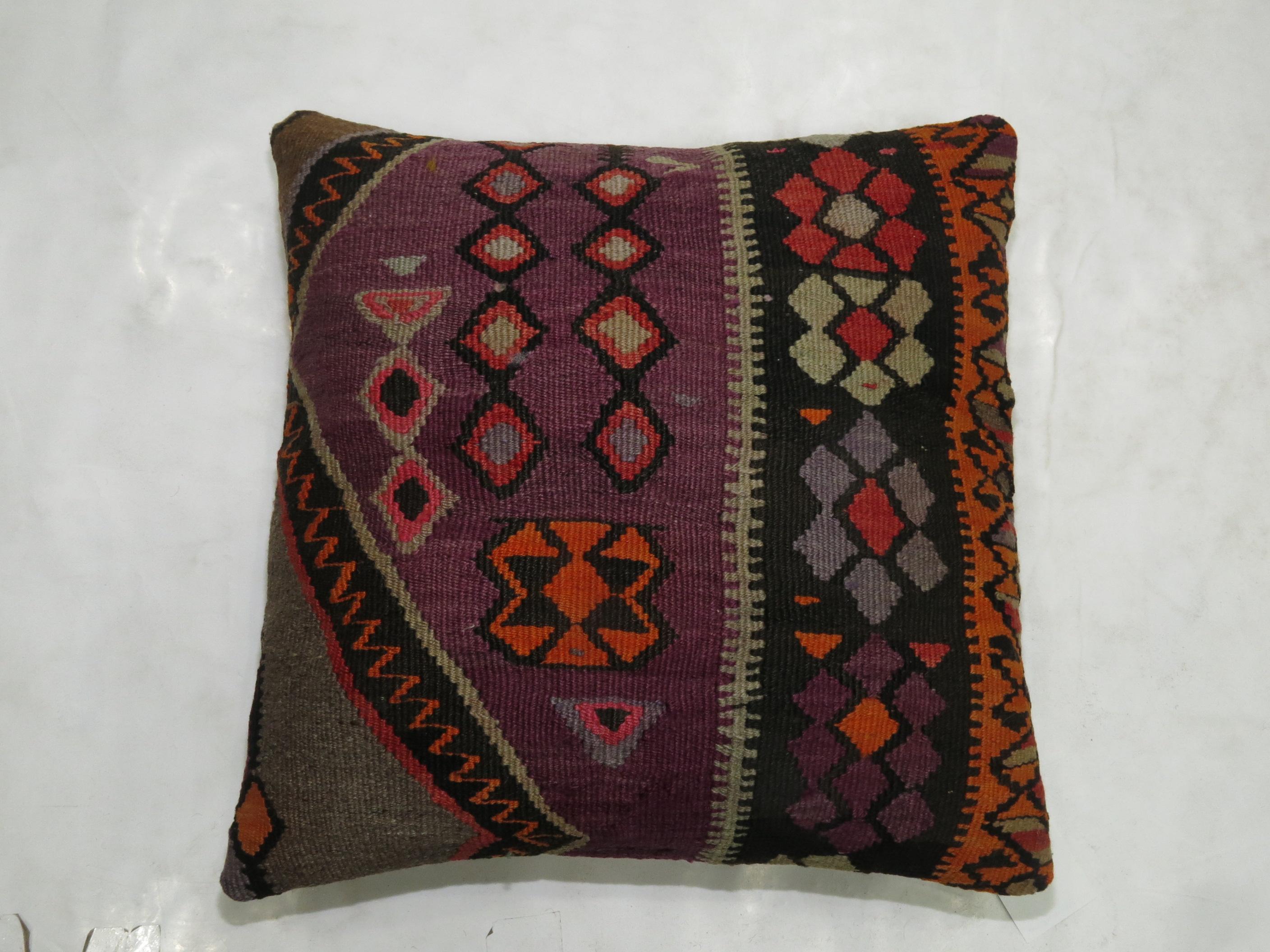 Pillow made from a Turkish Kilim In purple.

Measures: 19