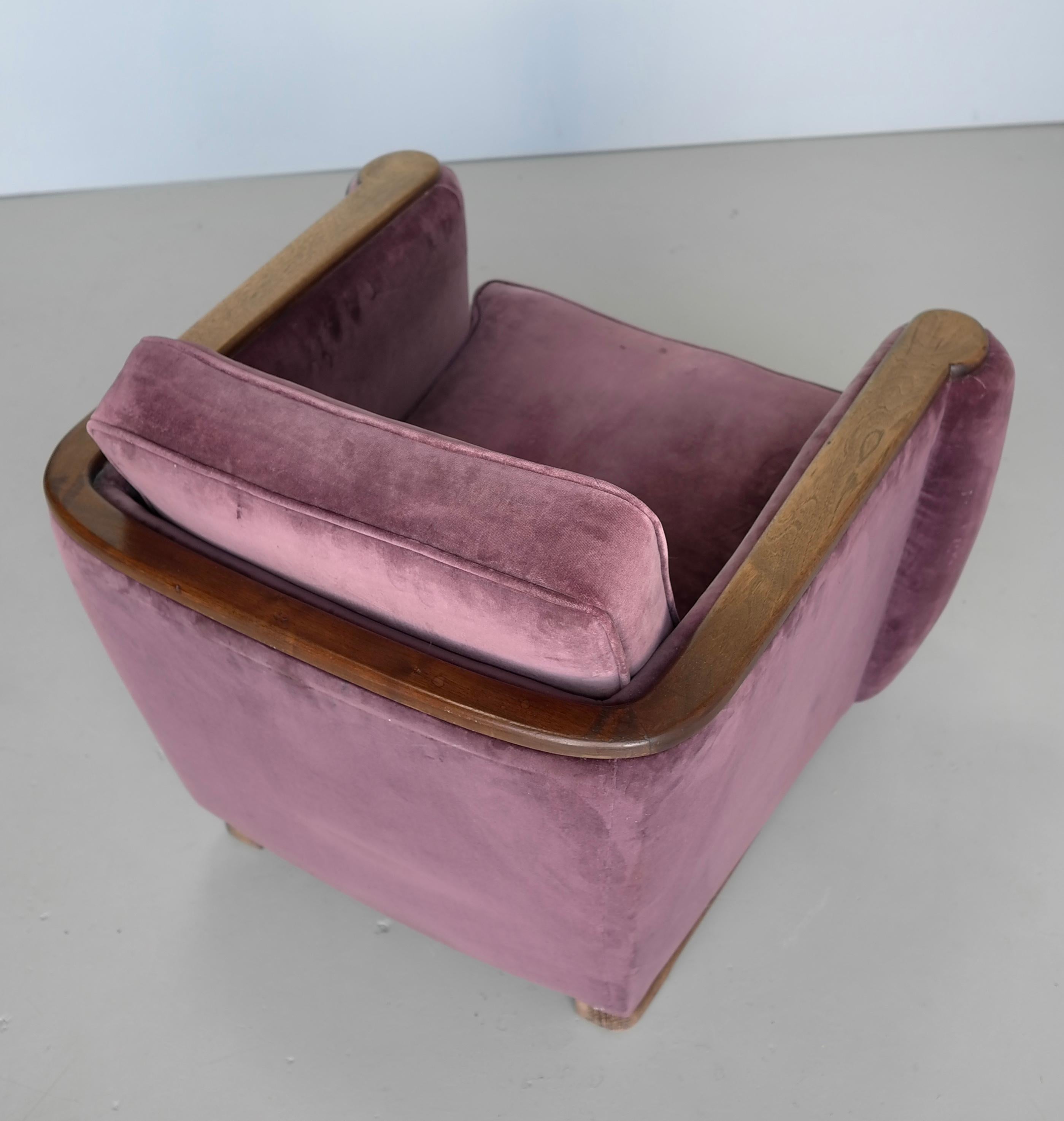 Purple Velvet and Wooden Art Deco Lounge Chair, France 1930's

Beautiful Wooden armrests that extend into the back.