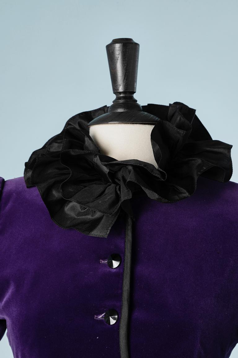 Purple velvet evening jacket with black taffetas Collar and cuff. Pink satin lining. 
SIZE 36 (S) 