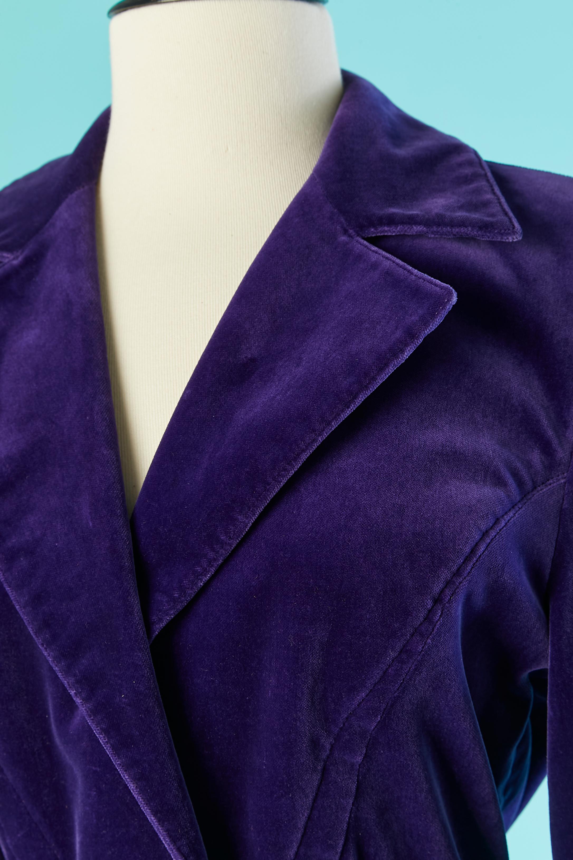 Purple velvet skirt-suit . Cotton velvet without lining, but velvet piping inside. Snap in the middle front and in the skirt middle back. Belt in velvet with buckle in the middle back. Elastic waist on the waist of the jacket. Pockets on both