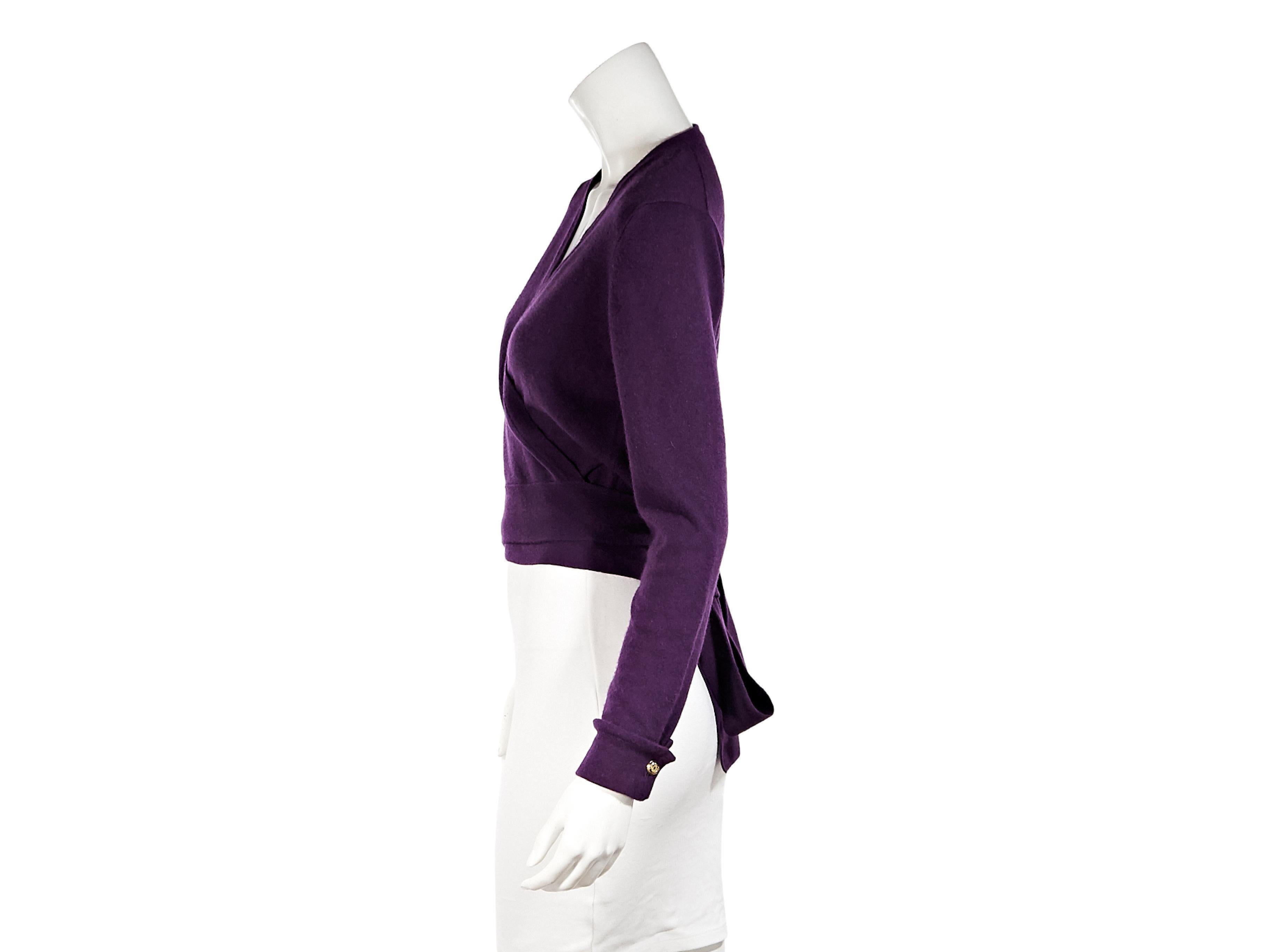 Product details:  Vintage purple cashmere cropped wrap sweater by Chanel.  V-neck.  Long sleeves.  Tie back closure.  30
