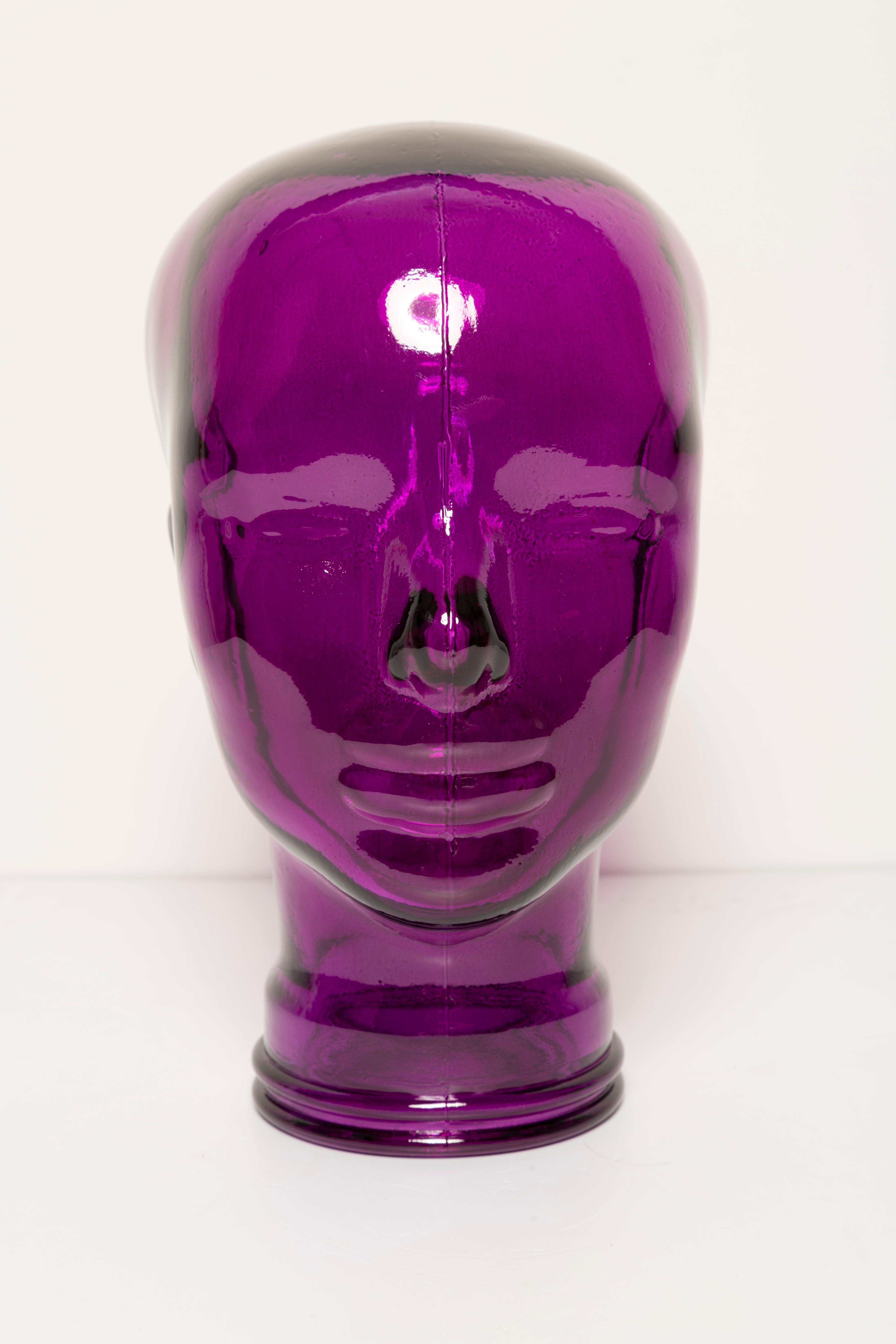 Life-size glass head in a unique purple color. Produced in a German steelworks in the 1970s. Perfect condition. A perfect addition to the interior, photo prop, display or headphone stand.