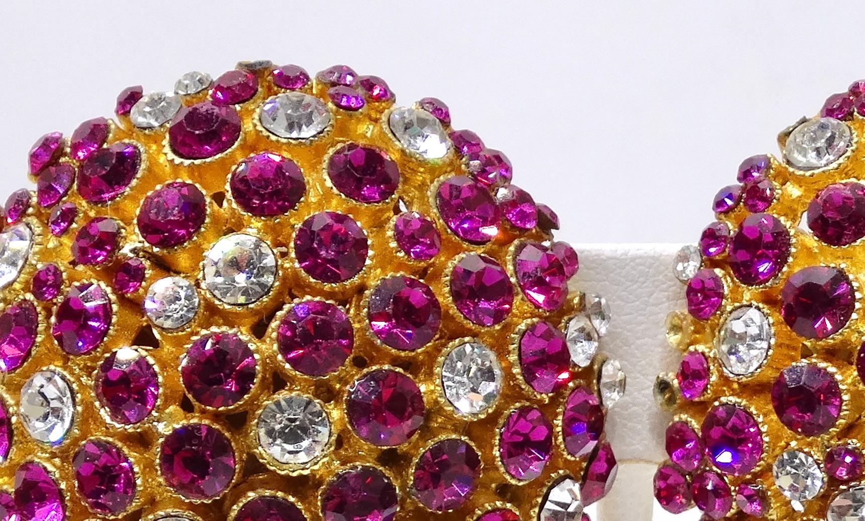 Here's your pop of magenta! No one will be able to resist complimenting you on these intricate adornments! Spice up any outfit by adding these fully crystalized dome shaped earrings. These earrings are large and chunky in size, with a two length and