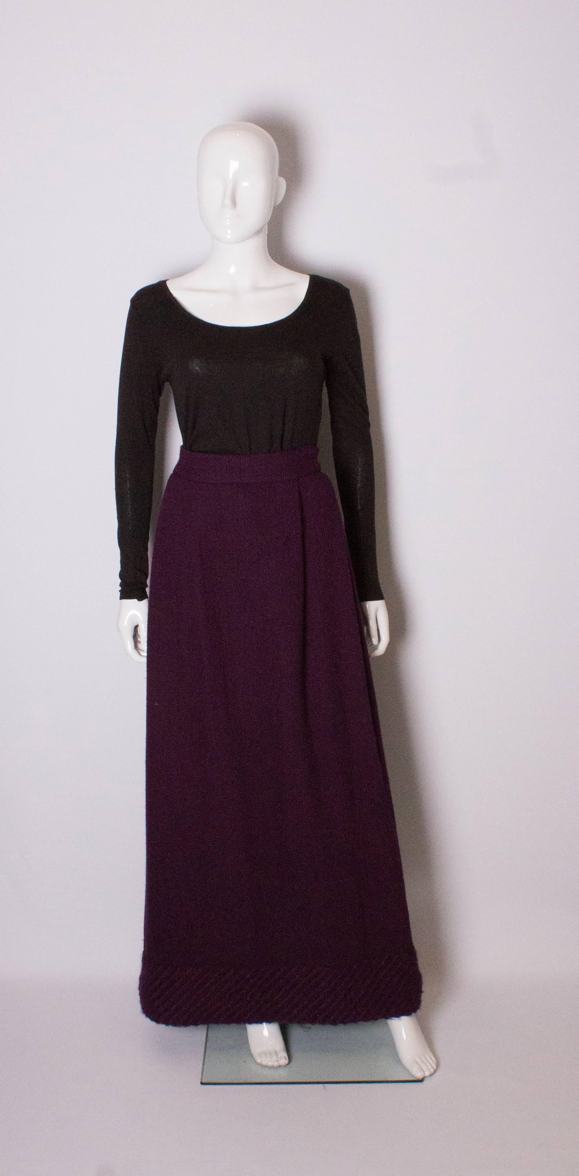 Great for chilly weather, this vintage  purple wool skirt by Scottish firm Inverhouse is fully lined, has a central back zip and a 5' 'woven hem, and so hangs beautifully. It is heavy.