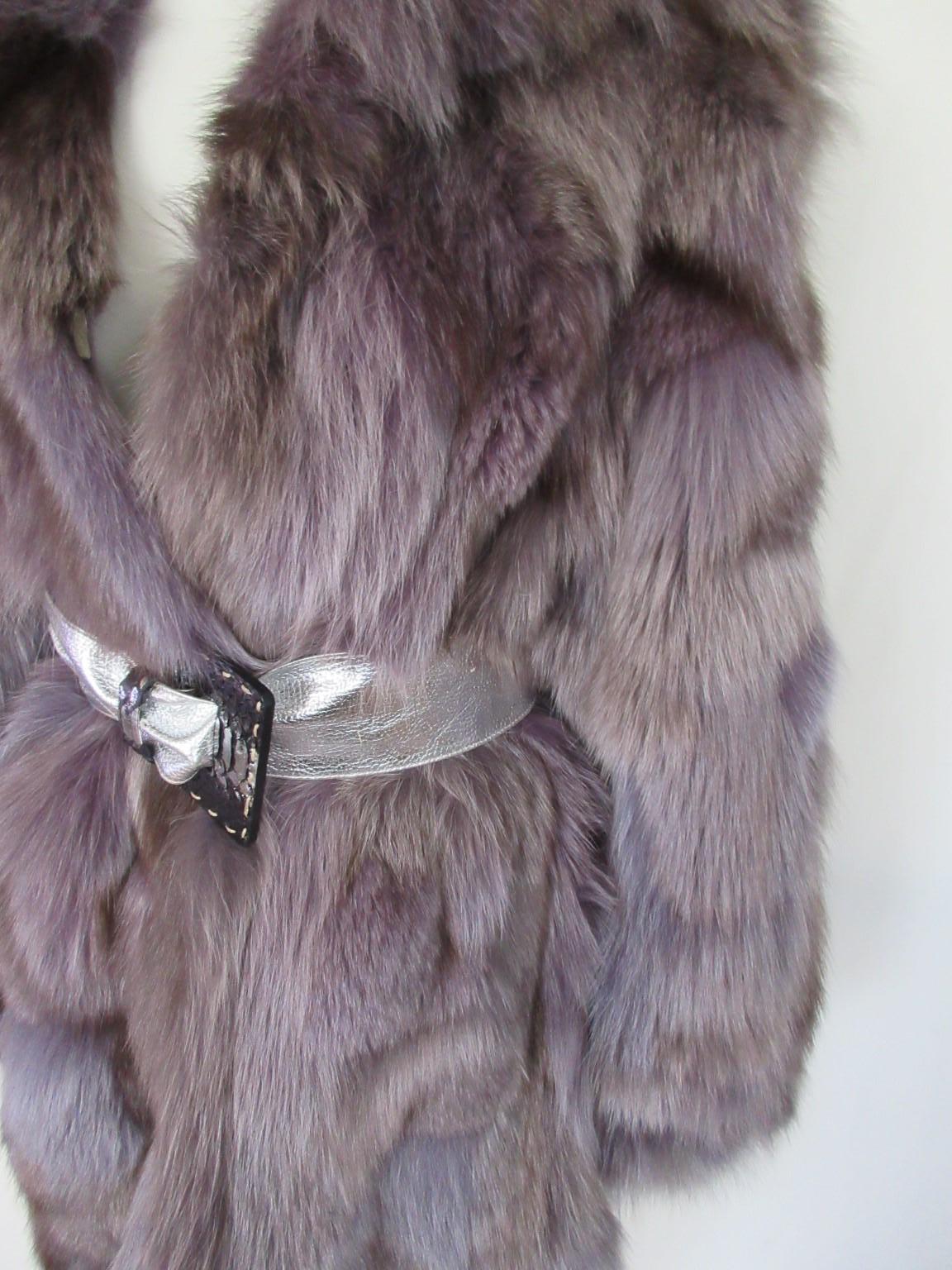 Beautiful purple/taupe/violet dyed fox fur coat, rare to find

We offer more exclusive fur items, view our frontstore

Details:
Soft fox fur
very light and supple
2 pockets and 3 closing hooks.
fully lined
Can be worn by men or women.
Belt is not