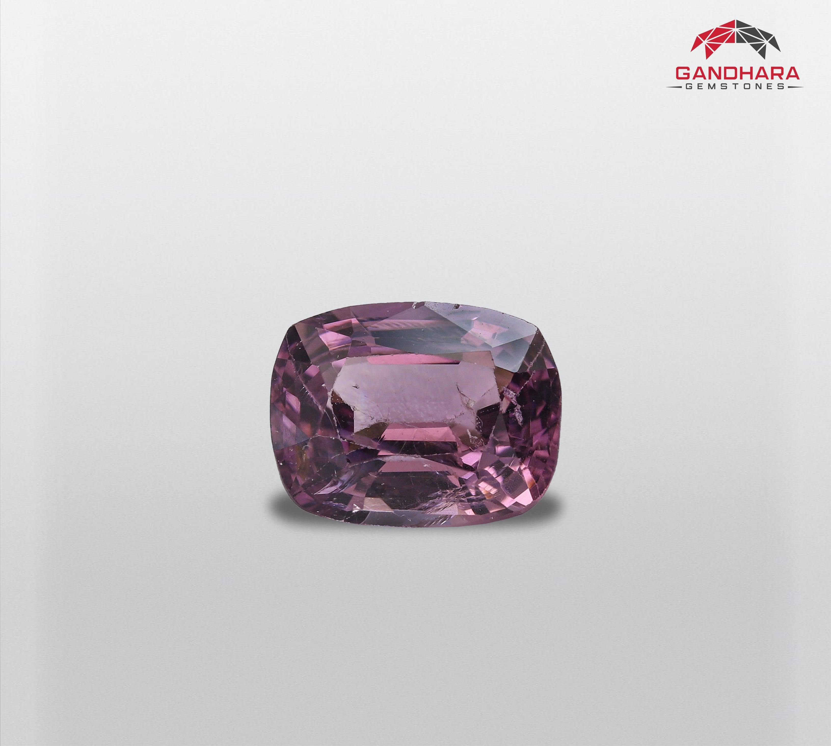 Purplish Pink Natural Spinel Gemstone, available for sale at wholesale price, Flawless SI clarity, custom cushion cut, 1.60 carats loose certified spinel from Burma.

Product Information:
GEMSTONE TYPE:	Purplish Pink Natural Spinel