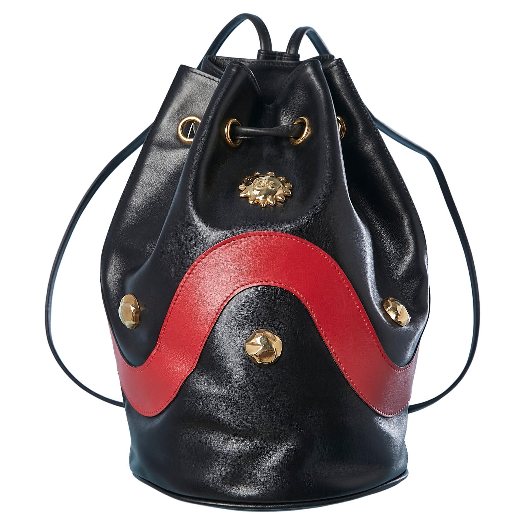 Purse bag in red and black leather with gold metal cabochon Christian Lacroix