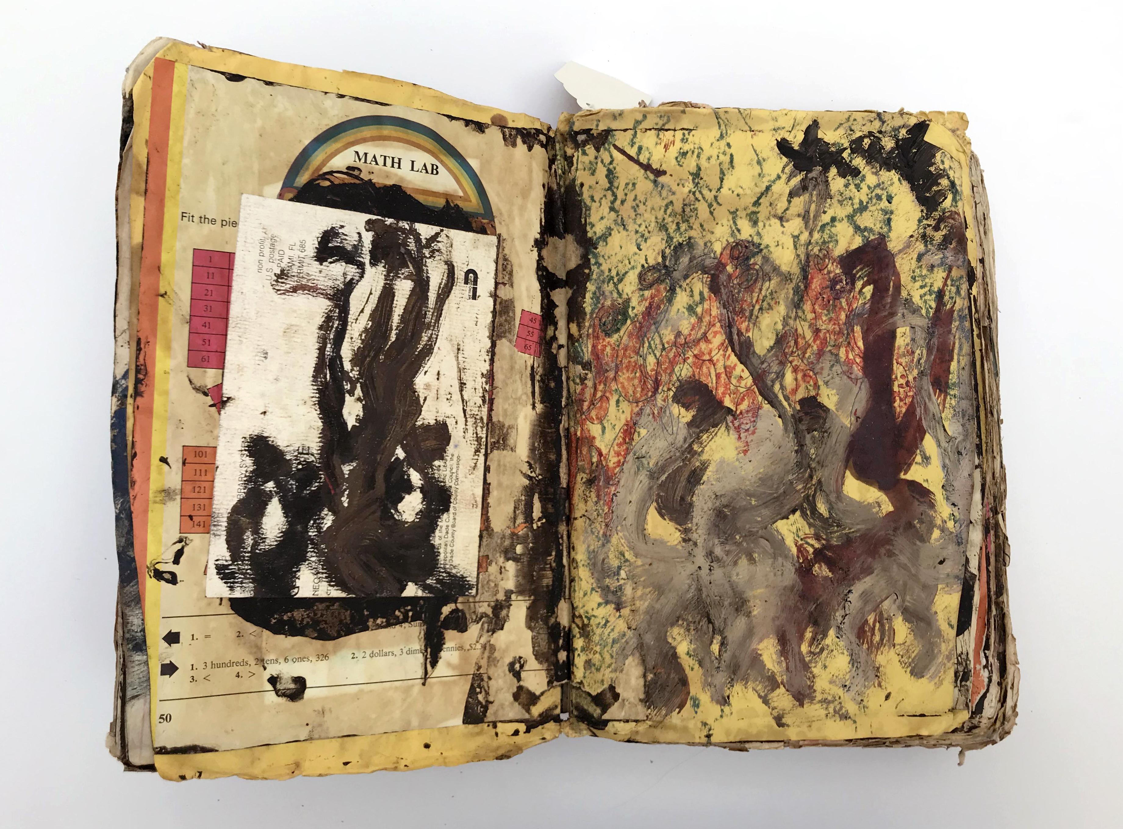 Painting and drawings glued into book by Purvis Young. 