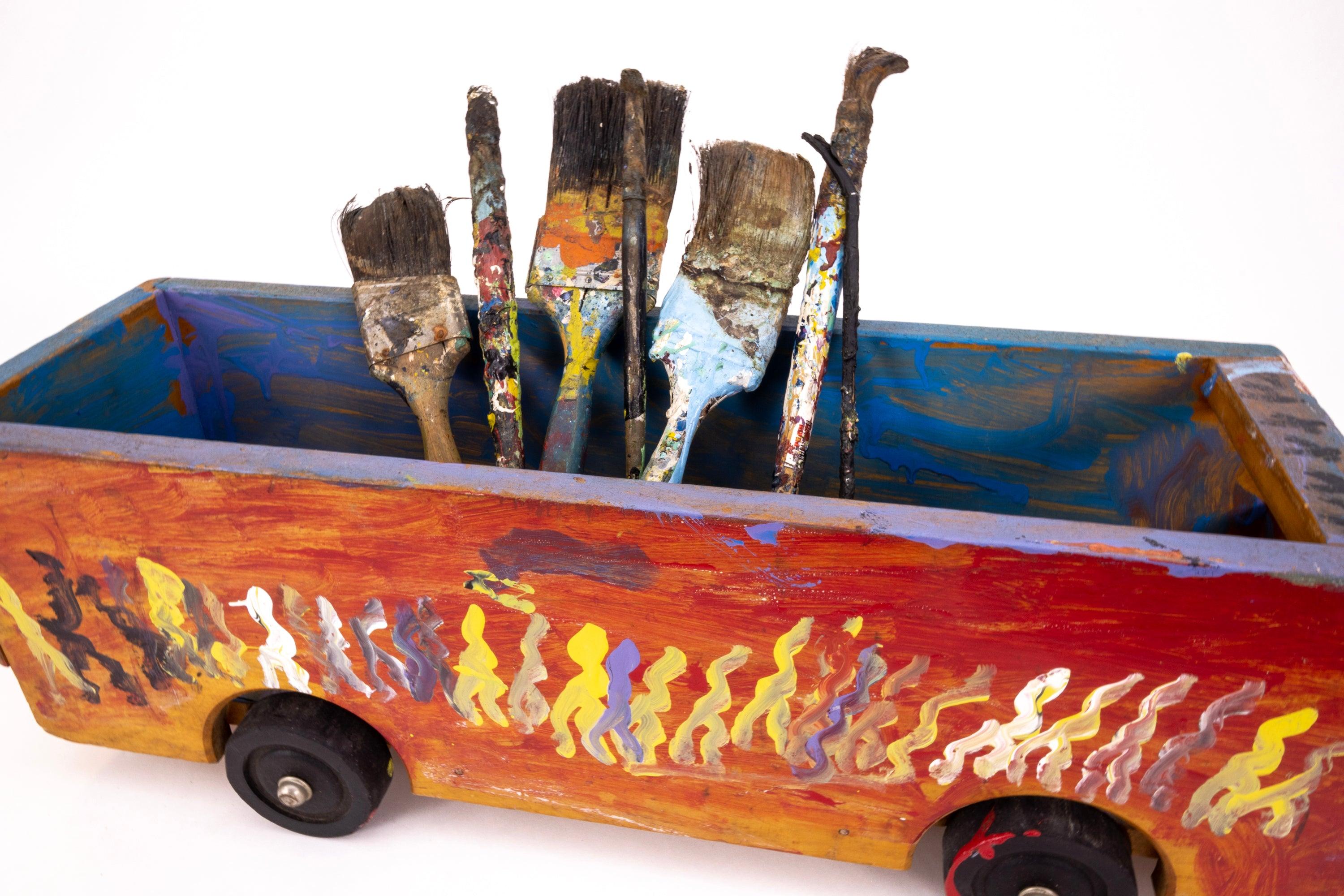 Artist: Purvis Young

Title: Bus and Seven Brushes

Medium: Mixed Media, Hand-Painting on Sculpture

Size: 7-7/8" x 23-3/4"

Edition: Original

Inscription: Signed "Young" on front


Known primarily for his original paintings, this extremely rare