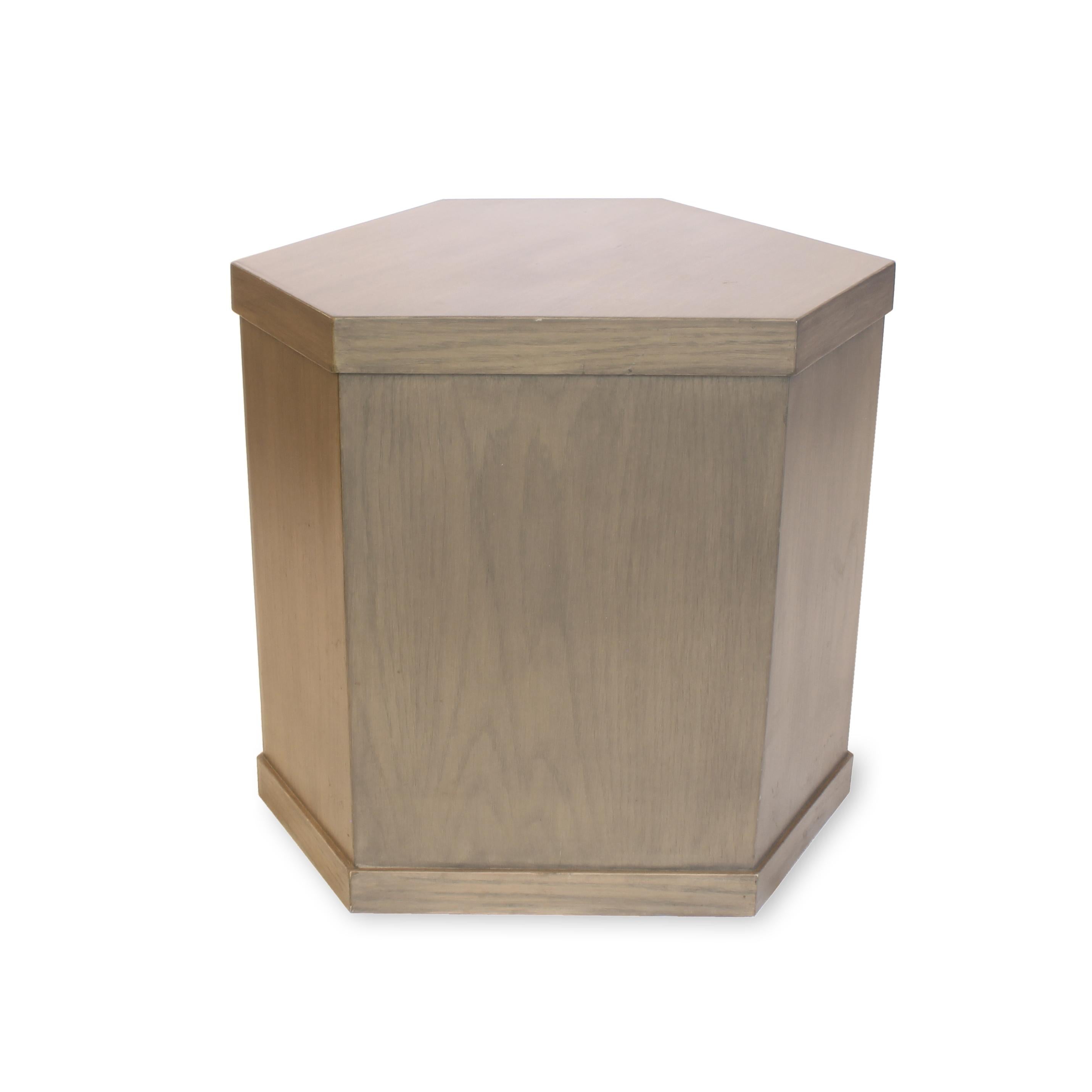 Triangular shaped side table that can double as a stool. The Putnam table frame is constructed from maple wood applied with oak wood veneer. Four standard finishes available.

Dimensions: 17