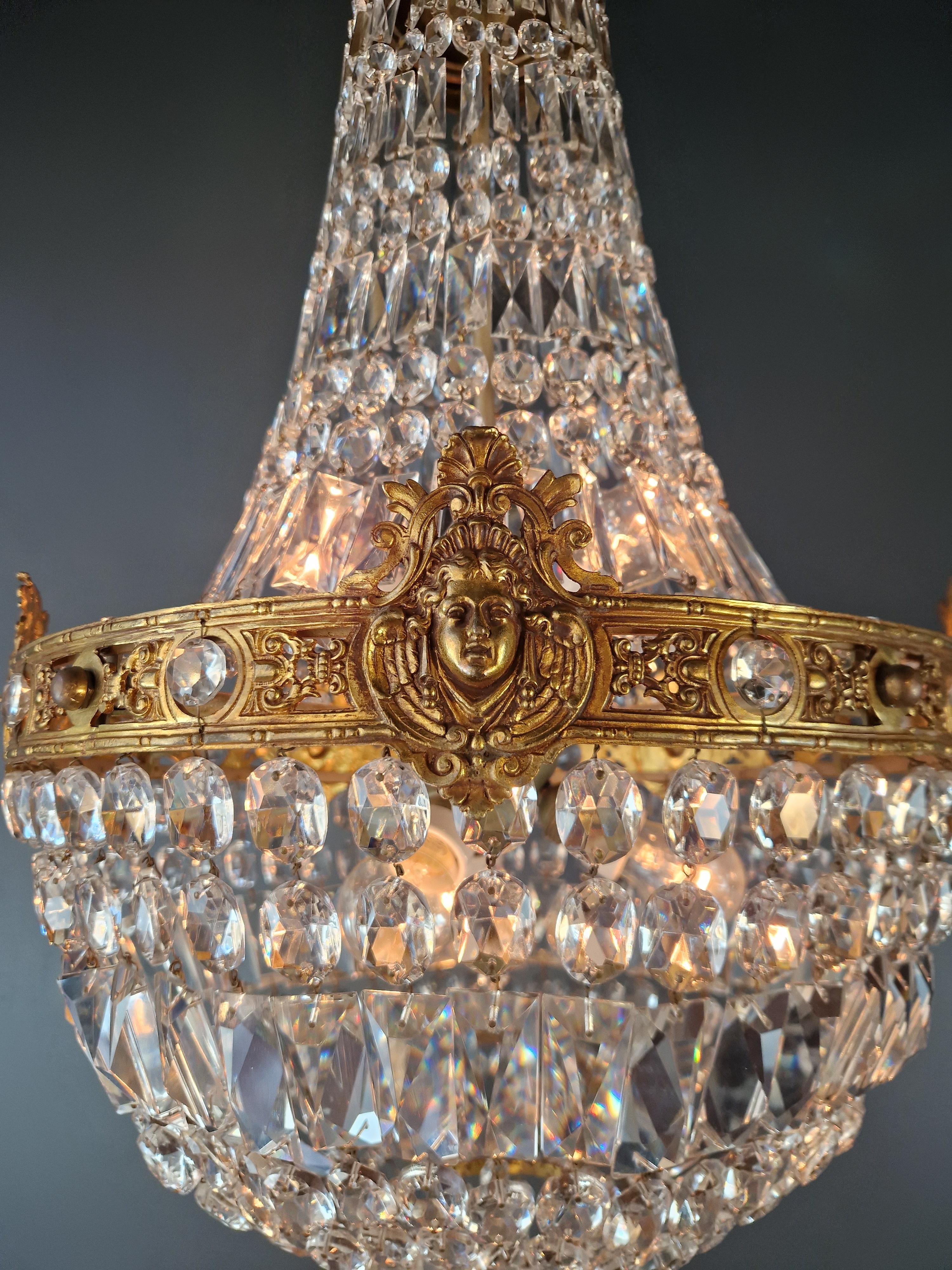 Annodato a mano Putti Face Empire Lampadario Cristallo Oro Cesto Ottone Antico Classico in vendita