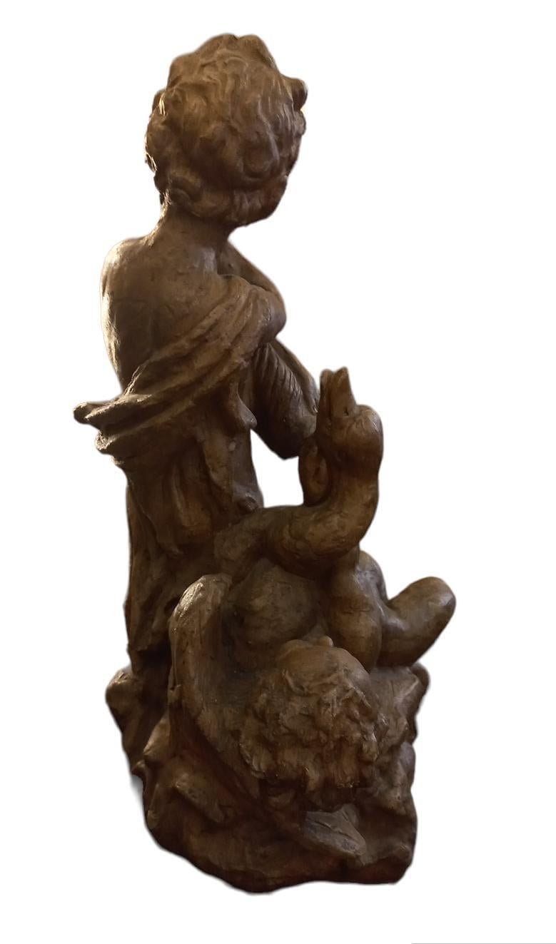 Other Putti with swan, 18th century terracotta For Sale