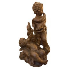 Putti with swan, 18th century terracotta