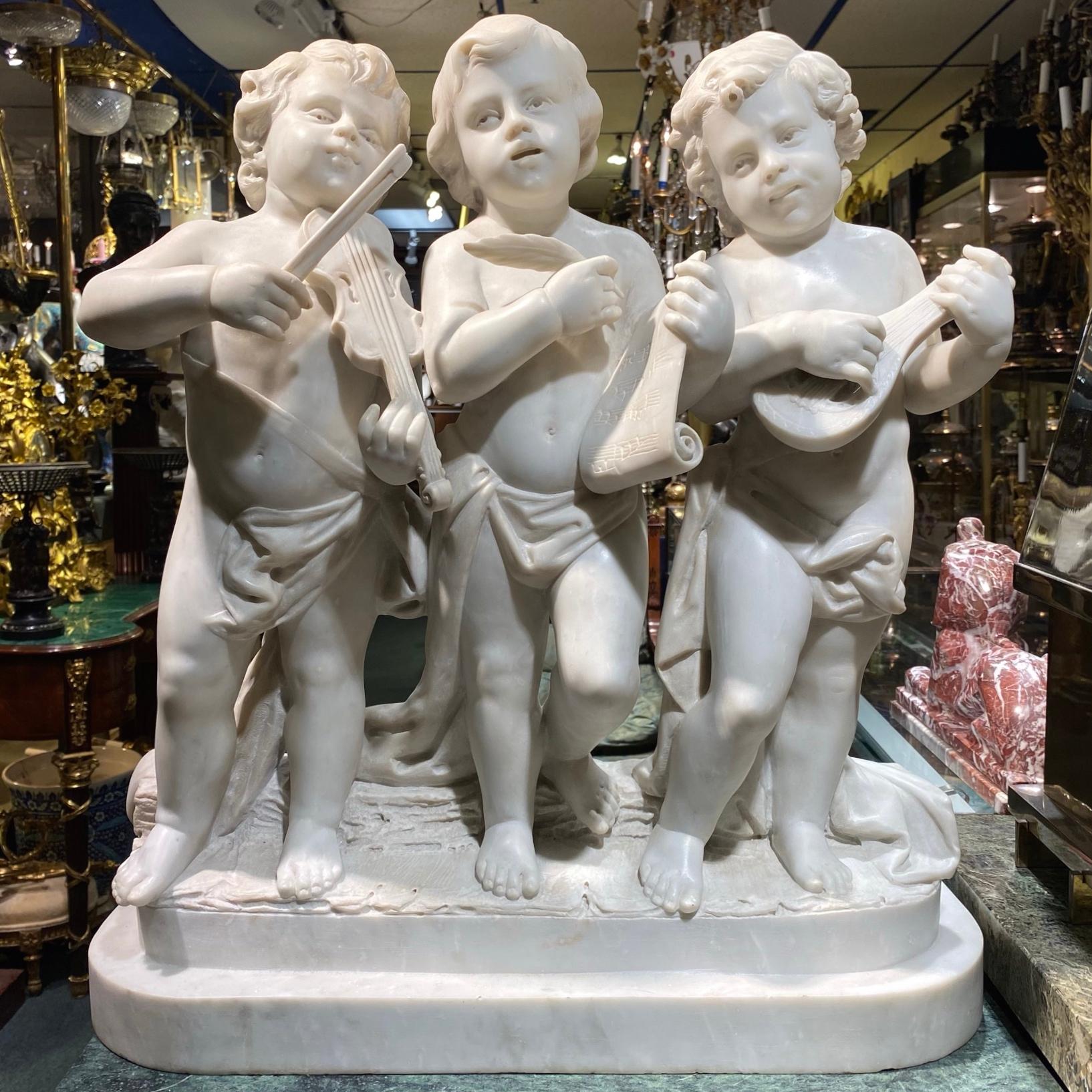 Fine quality Italian hand carved Putti Musicians marble sculpture.