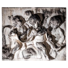 Putti Relief in Biscuit Porcelain, 19th Century