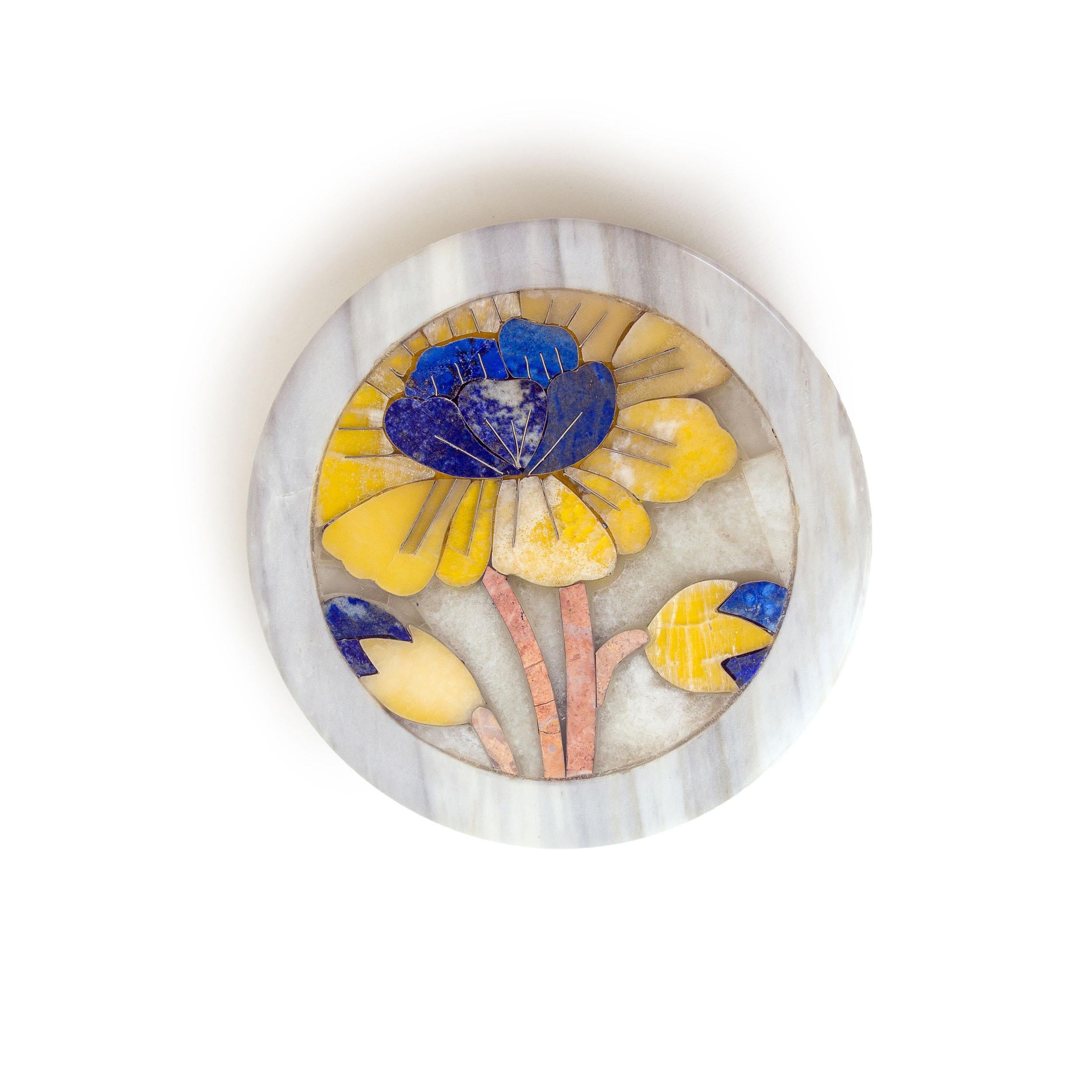 Puvvi box by Studio Lel
Dimensions: D 12.7 x W 12.7 x H 5 cm
Materials: Lapis Lazuli, onyx, marble.

From the Urdu word for the chrysanthemum flower, our Vogue-featuring Puvvi collection is a lively celebration of femininity. The collection