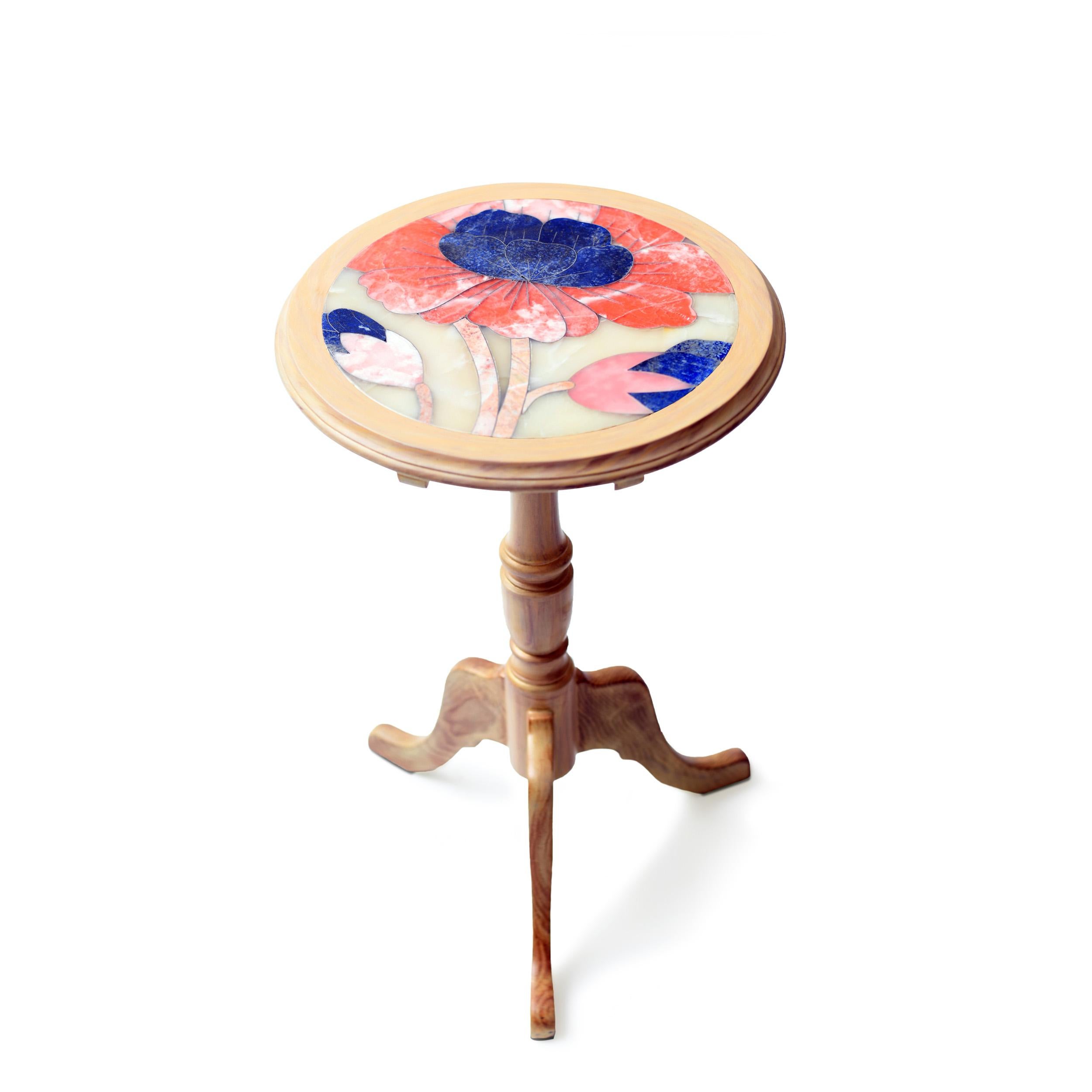 Puvvi Tilt-Top Pink Side Table by Studio Lel
Dimensions: D46 x W46 x H66 cm
Materials:Lapis Lazuli, Onyx, Marble, Wood

From the Urdu word for the chrysanthemum flower, our Vogue-featuring Puvvi collection is a lively celebration of femininity.