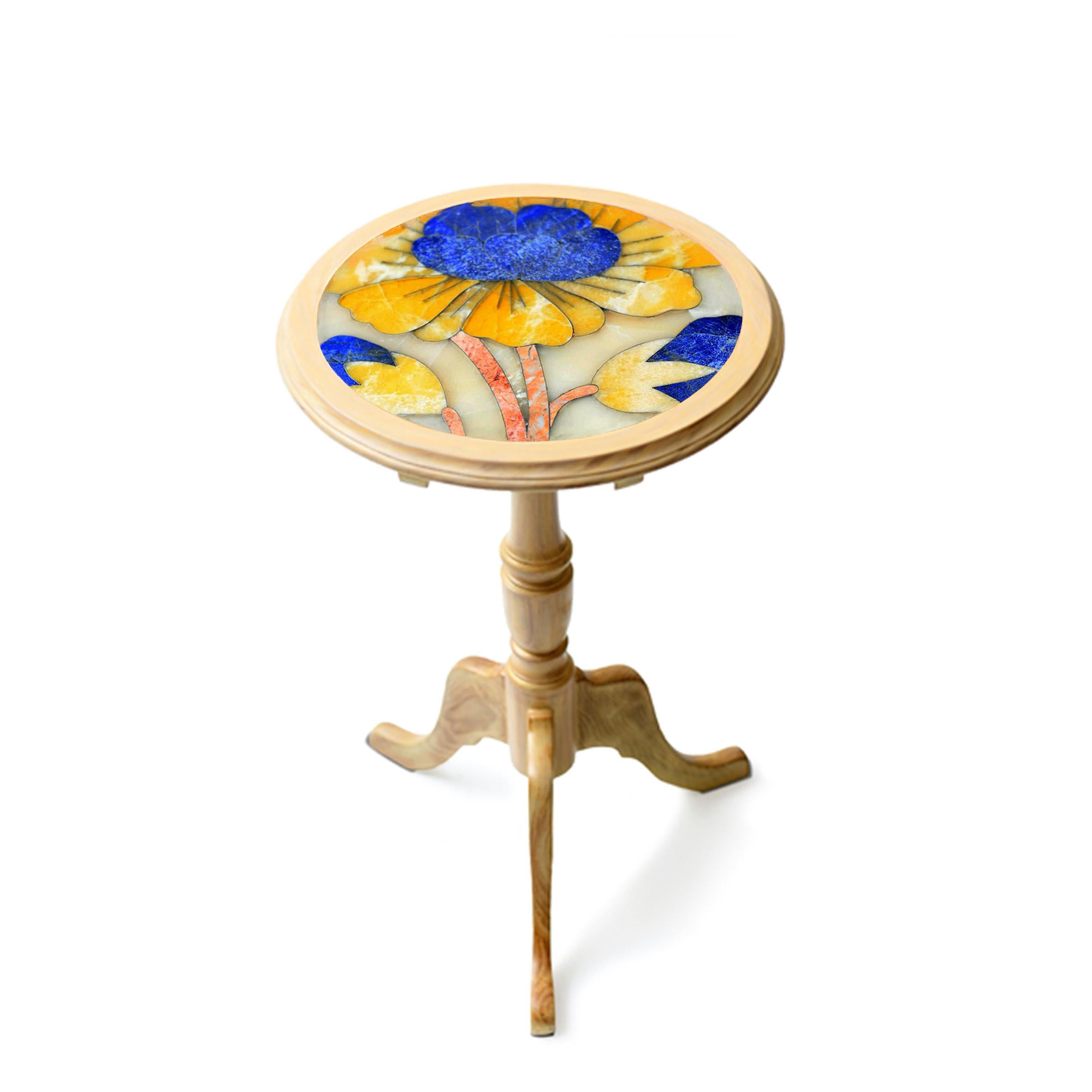 Puvvi tilt-top yellow side table by Studio Lel
Dimensions: D46 x W46 x H66 cm
Materials:Lapis Lazuli, Onyx, marble, wood

From the Urdu word for the chrysanthemum flower, our Vogue-featuring Puvvi collection is a lively celebration of