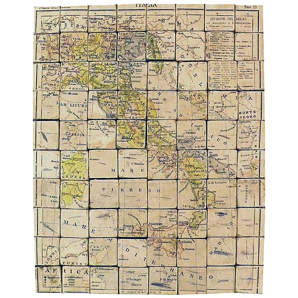 80 kleine Holzwürfel, die mit bedrucktem Papier überzogen sind und je nach Seite die Karten von Italien, Europa, Nordamerika, Südamerika, Asien und Afrika bilden. Modelle für den Unterricht. G.B. Paravia&C., Mailand, Italien.