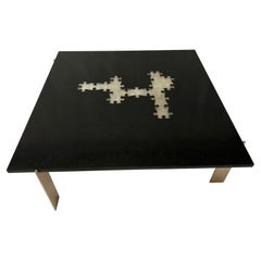 Puzzle coffee table in black granite and rock crystal from Madagascar