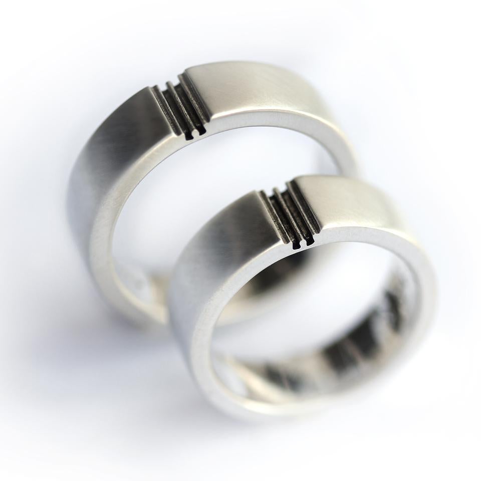 For Sale:  Puzzle matching couple rings set in Sterling silver 6