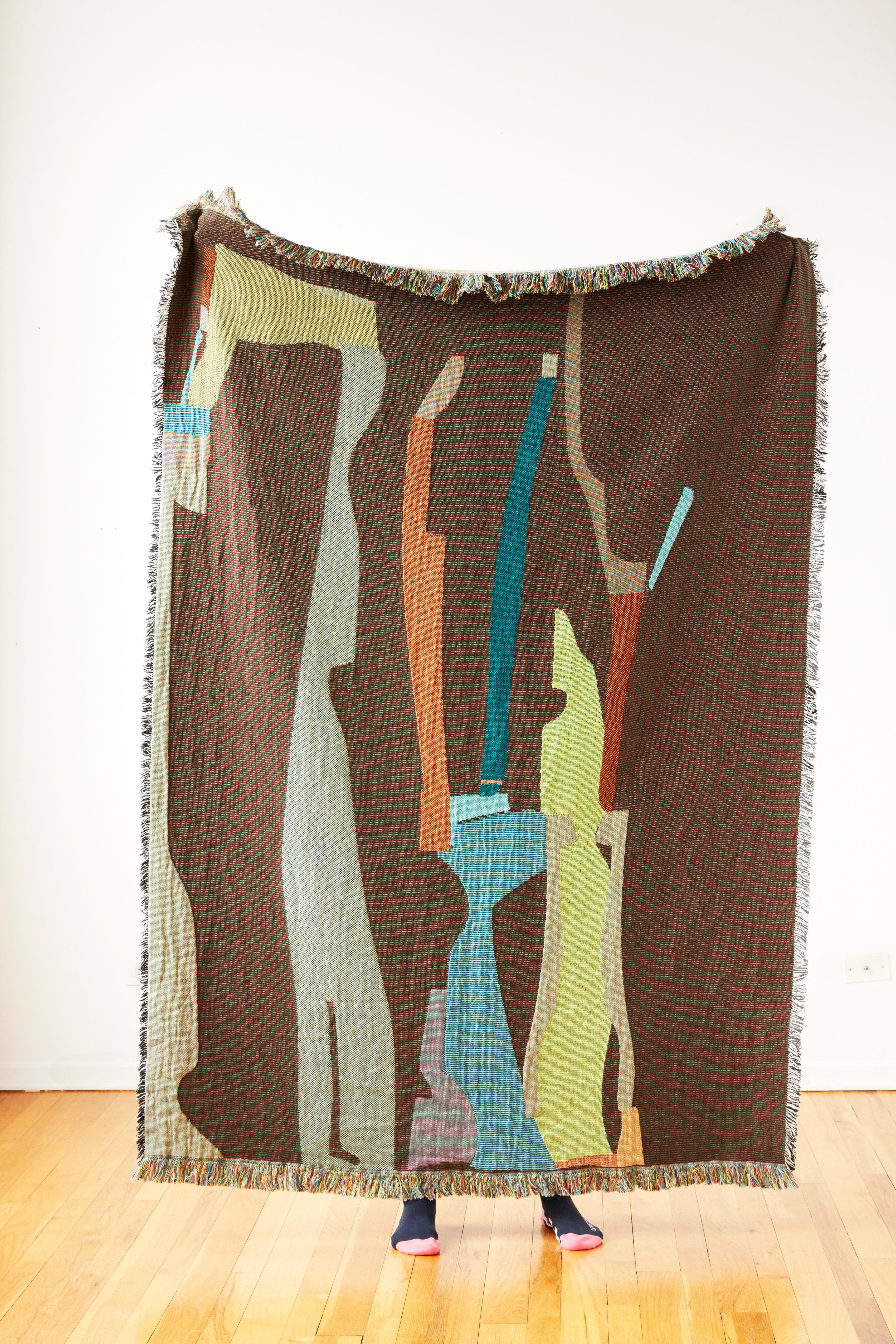 Puzzle woven throw is 100% cotton, jacquard woven with a reversible design. Cozy as a throw to wrap up in, and a beautiful art piece for the wall.
Designed in Chicago, woven in North Carolina.
Care: Machine wash on cool gentle cycle, tumble dry on