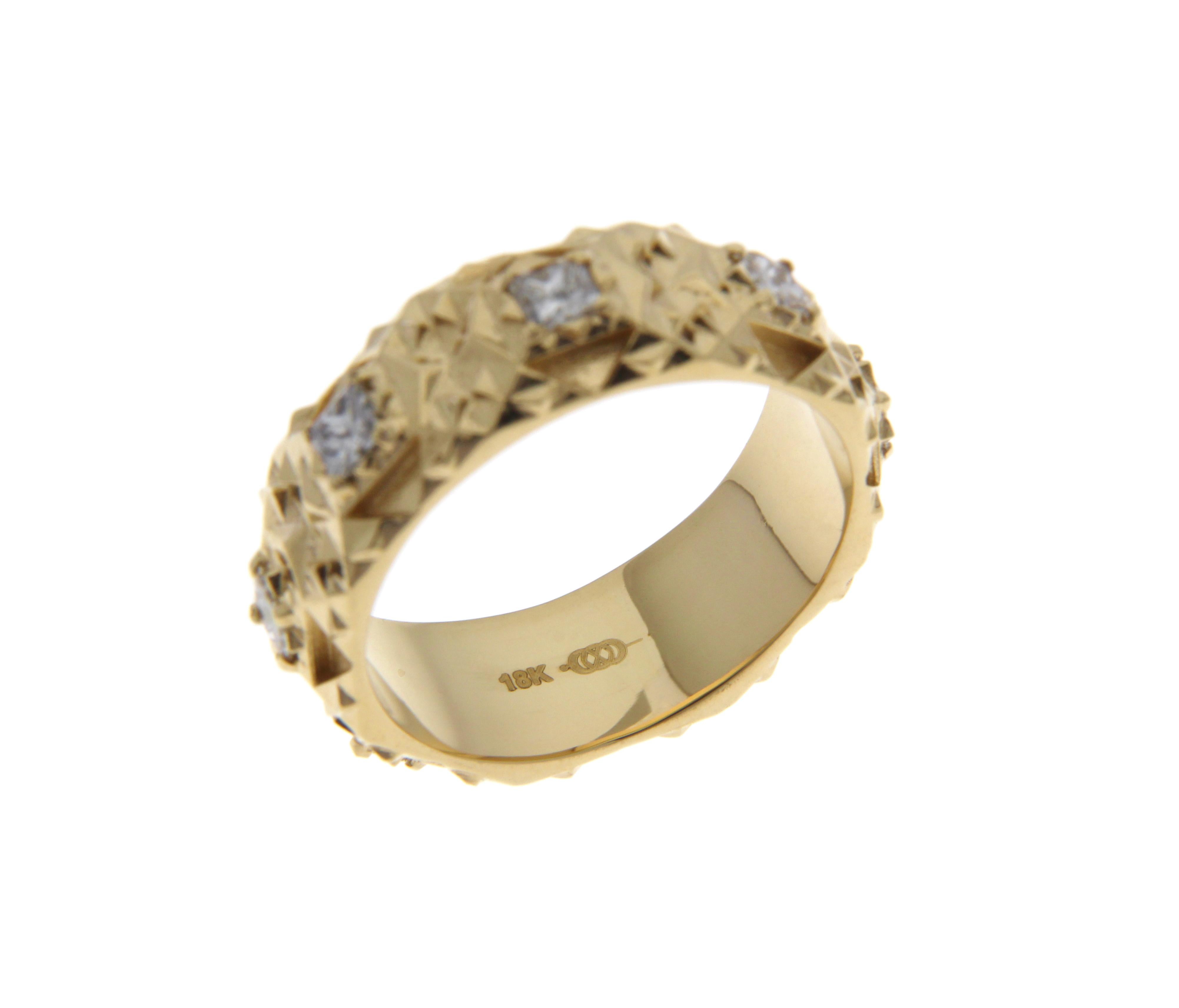 This ONE OF A KIND Piece is inspired by ancient temples and fractals to empower the wearer. This 18k unique piece can be worn as an everyday ring or used as a wedding band. 

John Brevard applies his background in architecture and multidisciplinary