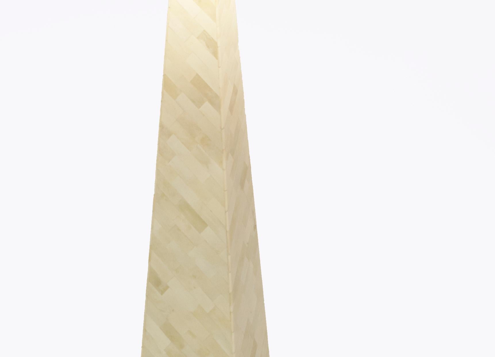 Named after the Japanese pyramid museum, this floor lamp boasts a strong shape accented by a diagonal arrangement of camel bone chip. 
Lamp shade not included.
Size: 7