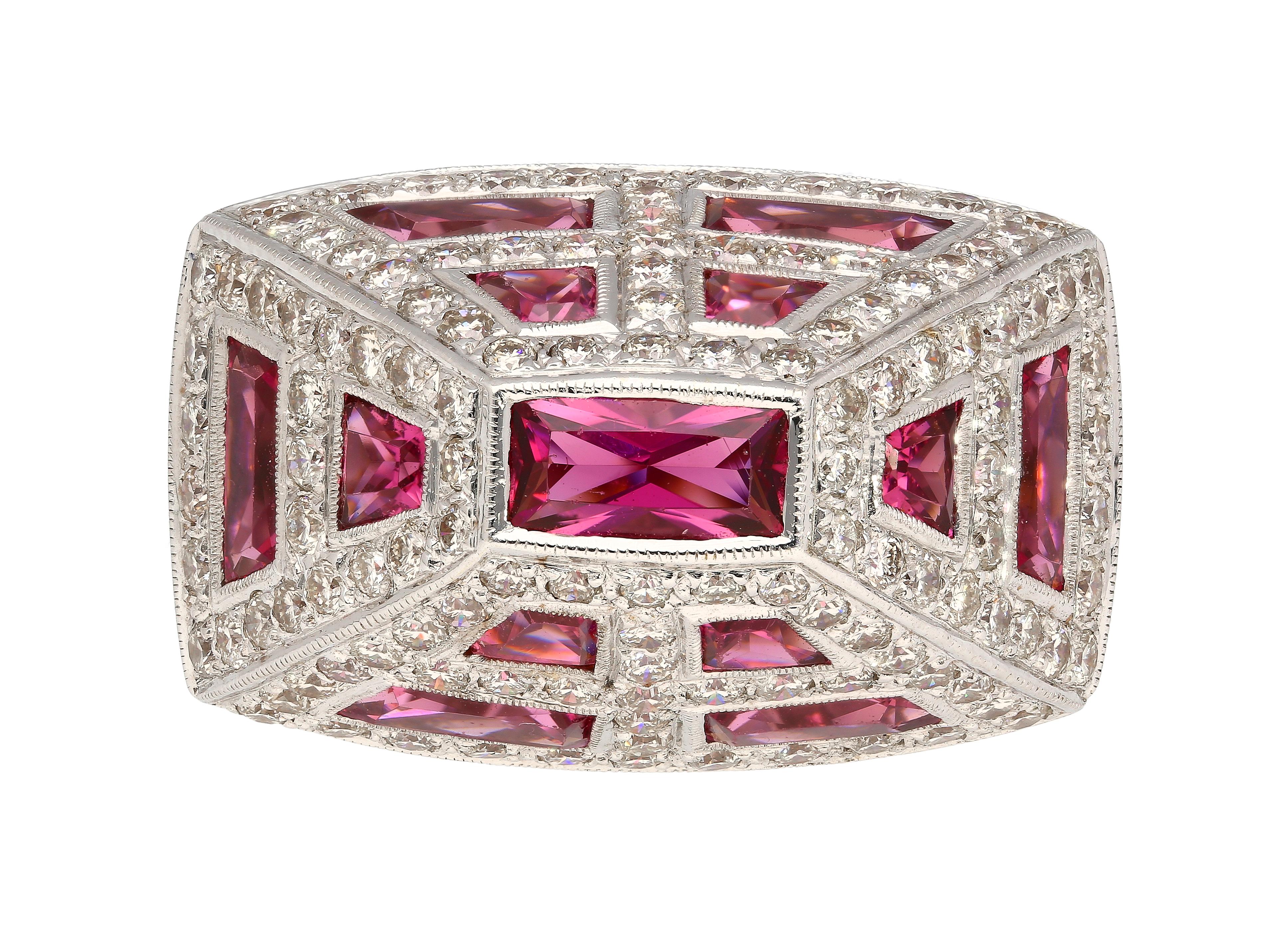 18k white gold pyramid shaped ascending men's and unisex ring. Featuring a cluster of bezel and prong set Pink Tourmalines and white diamonds. This ring has a stunning symmetrical aesthetic that offers excellent color contrast and sharpness.

Ring