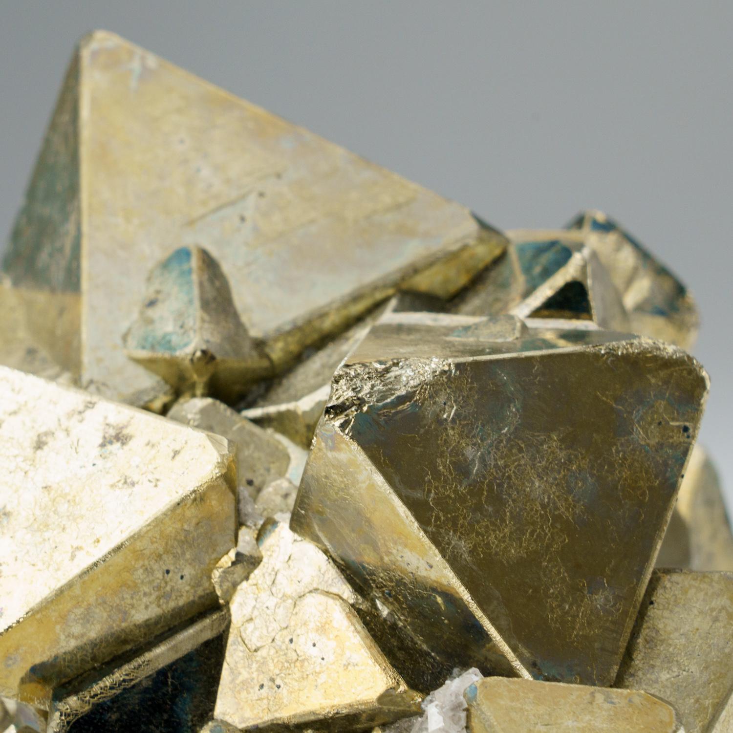 A classic and very attractive specimen of Pyrite from Peru. Brilliant crystals of metallic pyrite on a pyrite matrix. The pyrite crystals have excellent surface luster and have small cubic and dodecahedral faces on the edges and corners.

Weight:
