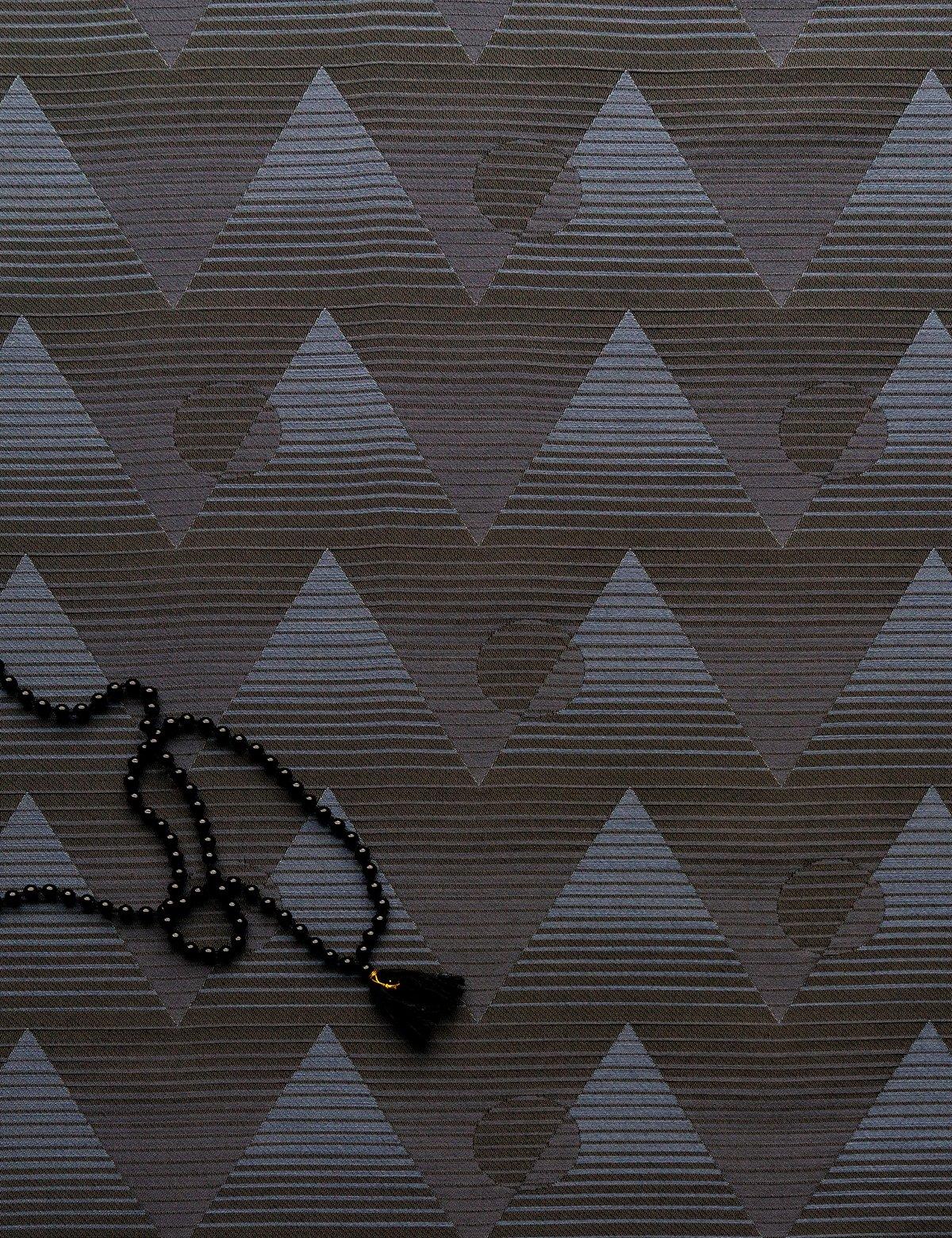 A subtly optical pattern manifesting the ancient sun’s shadow and its balance with the earth. This design features pyramid and sun as they represent the illusive quality of time.

This product is a Jacquard woven, commercial grade fabric. 

Samples