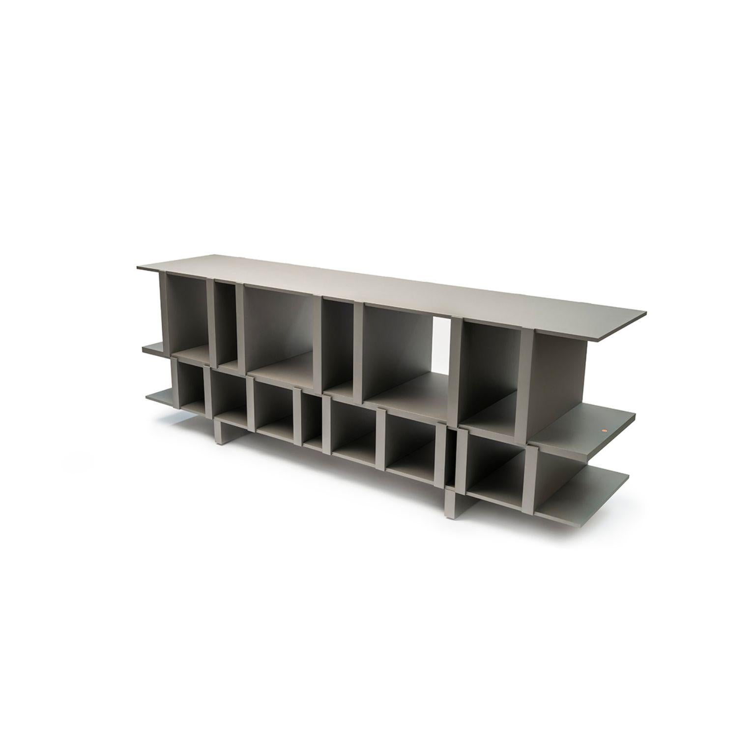 Pyrite bookshelf by Luca Nichetto
Materials:
Dimensions: W 200 x D 31.6 x H 69 cm

Inspired by optical illusion artworks, the design of Pyrite bookshelf amazes through an unexpected
distribution between empty and full spaces and a structure