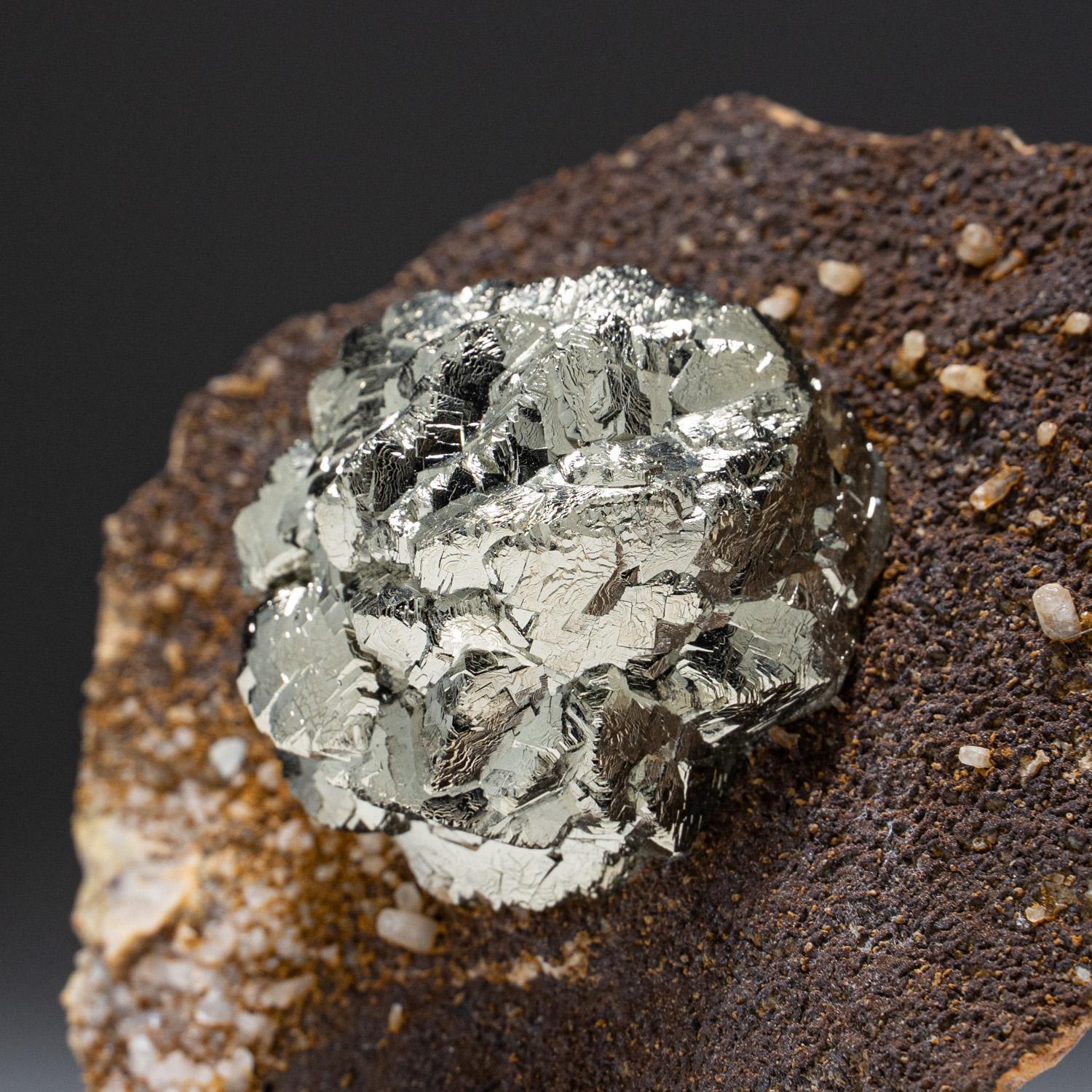 Lustrous radial formation rich golden pyrite crystals a 3 dimension form on matrix embedded with quartz. The pyrite crystals faces have a mirror luster with rich golden yellow tone all throughout. This stunning example of natural pyrite is the
