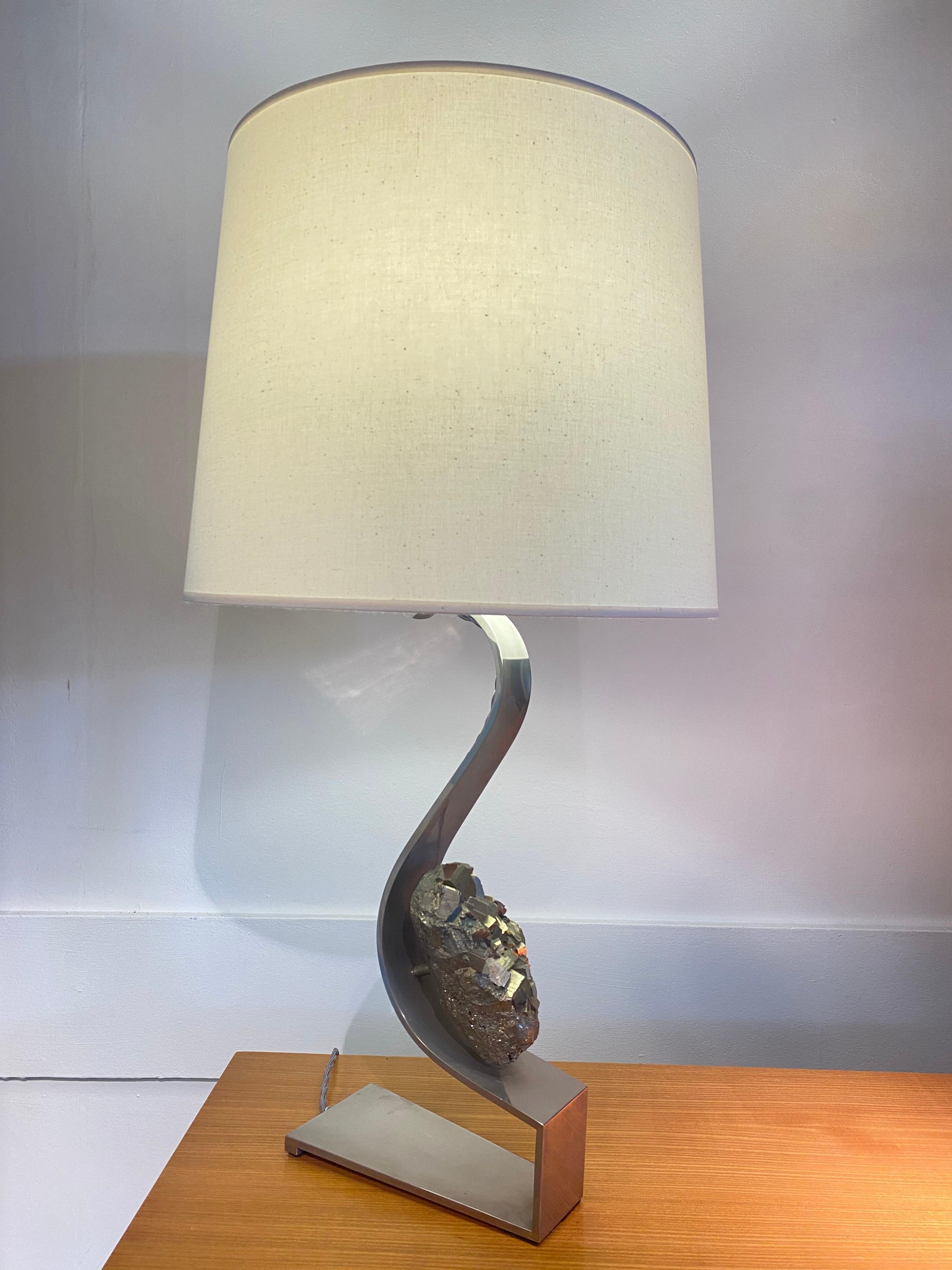 1970S steel and mounted pyrite rock lamp by Claude De Muzac
Good vintage condition
Brand new shade.