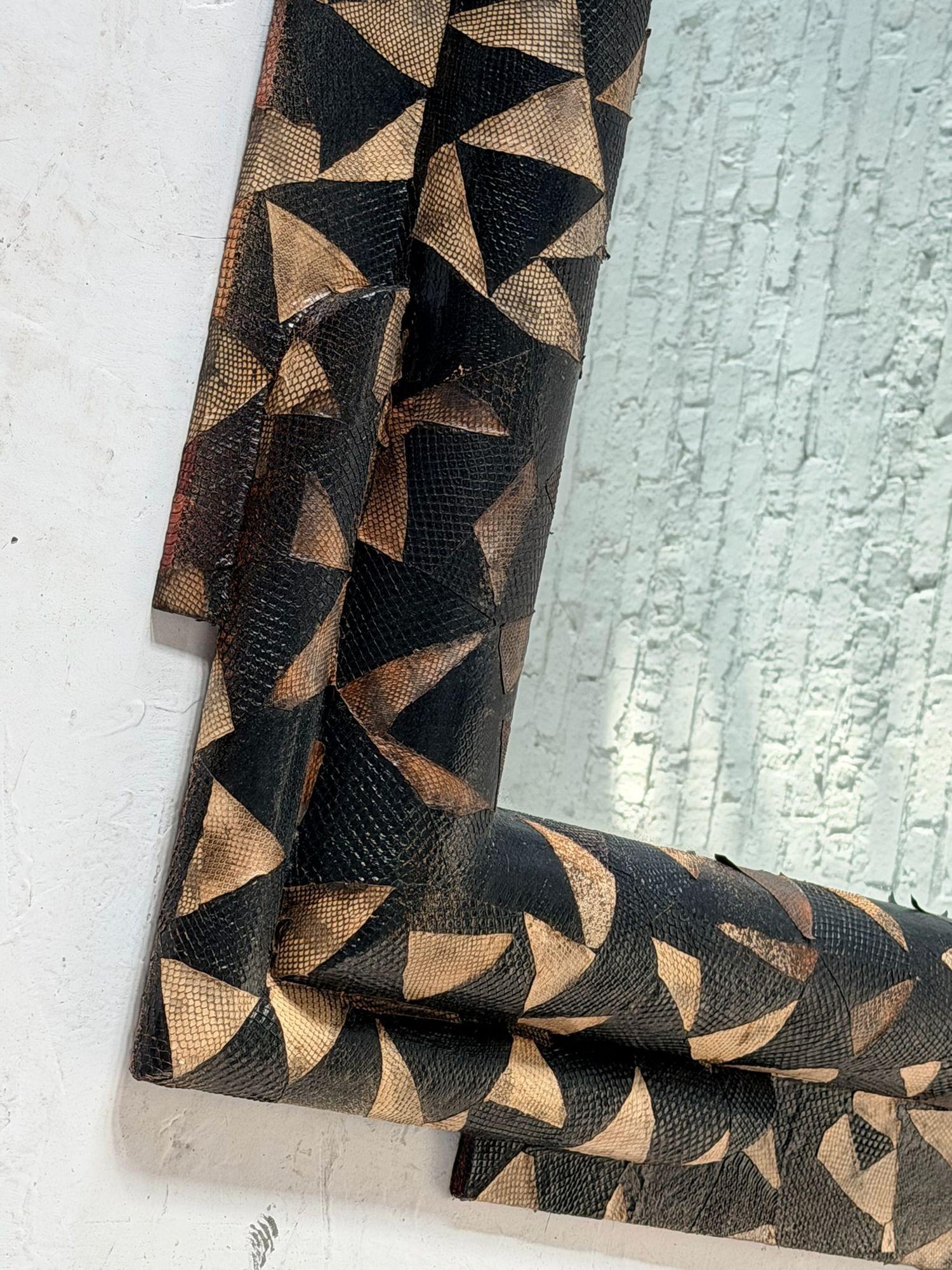 Python Mirror, Harold Zimmerman Collection, 1988.  Original stunning large mirror.o.  In the style of Karl Springer.
Measures 48” wide 60” tall 3” deep.