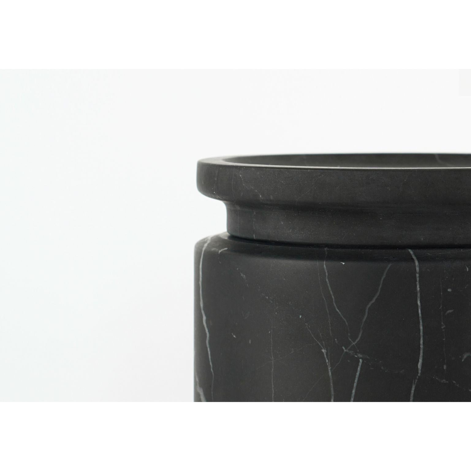 Pyxis - small pot - black by Ivan Colominas
Pyxis Collection
Dimensions: 12.6 x 11 cm
Materials: Nero Marquinia

Also available: Bianco Michelangelo, medium & large

A refined collection articulated through cylinders that vary only in size