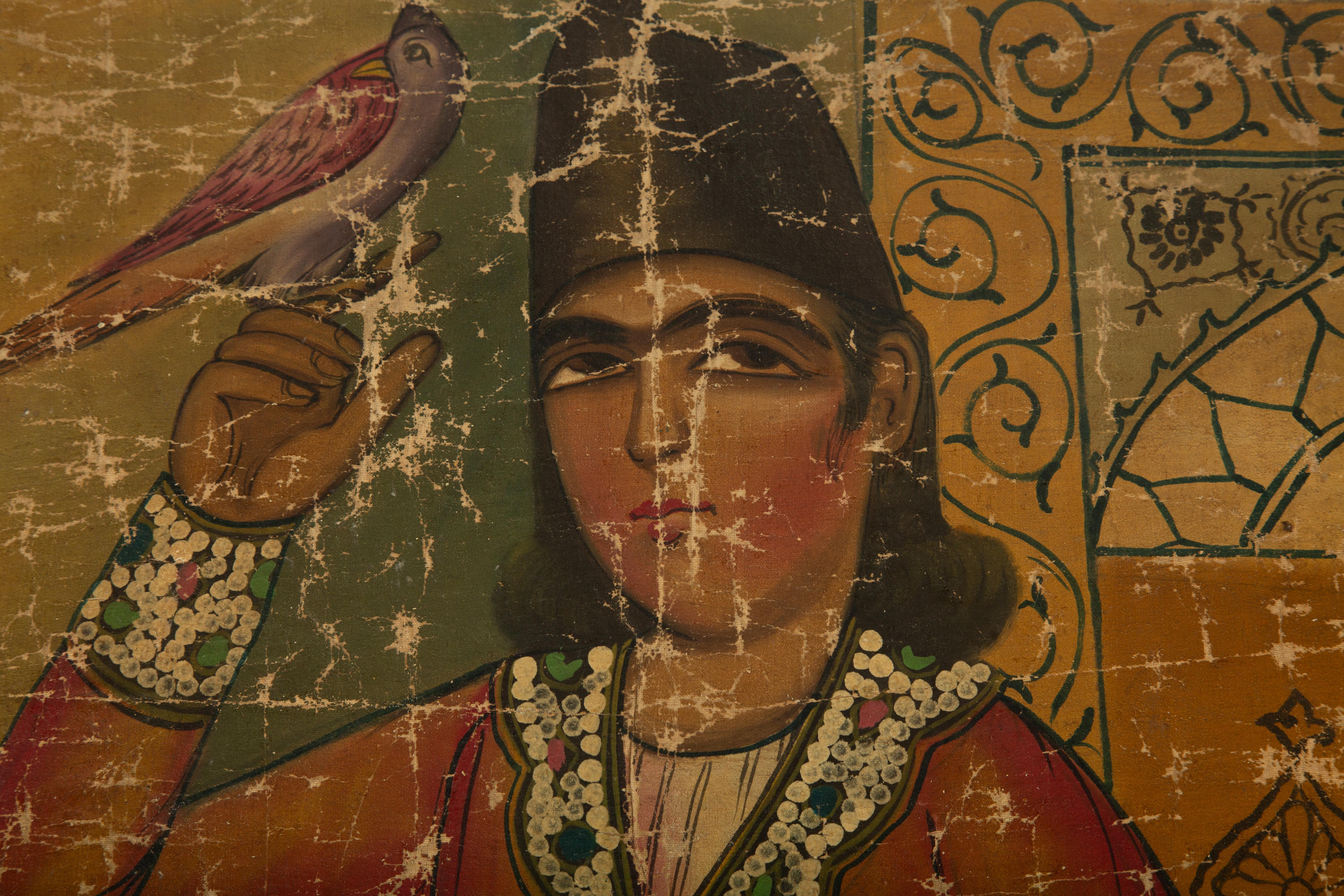 Iran, Qajar-Schule, frühes 20. Jahrhundert
Öl auf Leinwand mit der Darstellung eines Mannes in traditioneller persischer Kleidung, der einen Raubvogel auf seiner Hand hält, vor einem architektonischen Hintergrund mit ornamentalem Fenster und